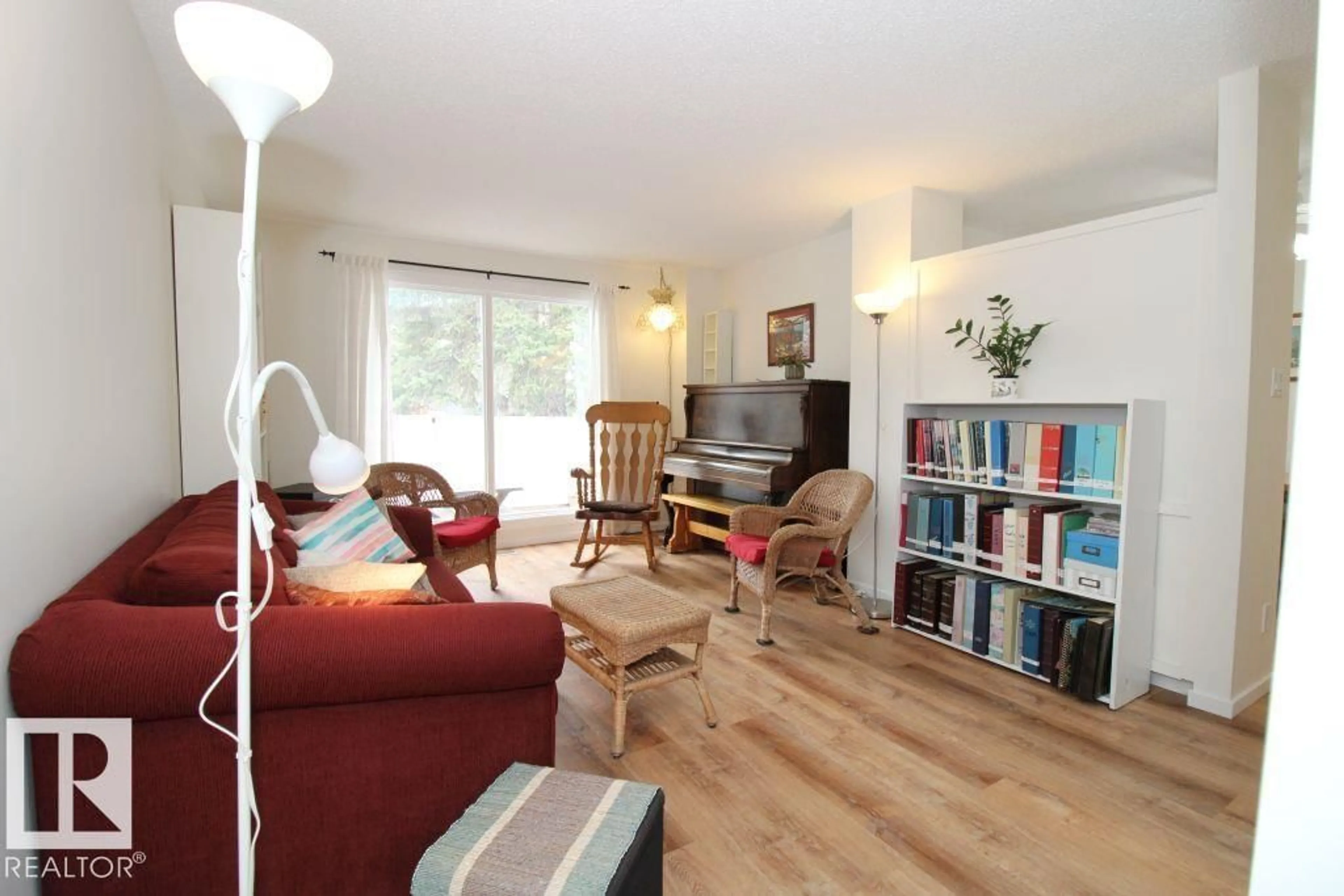 Living room with furniture, wood/laminate floor for #130 - 130 BROOKWOOD DR, Spruce Grove Alberta T7X1A6