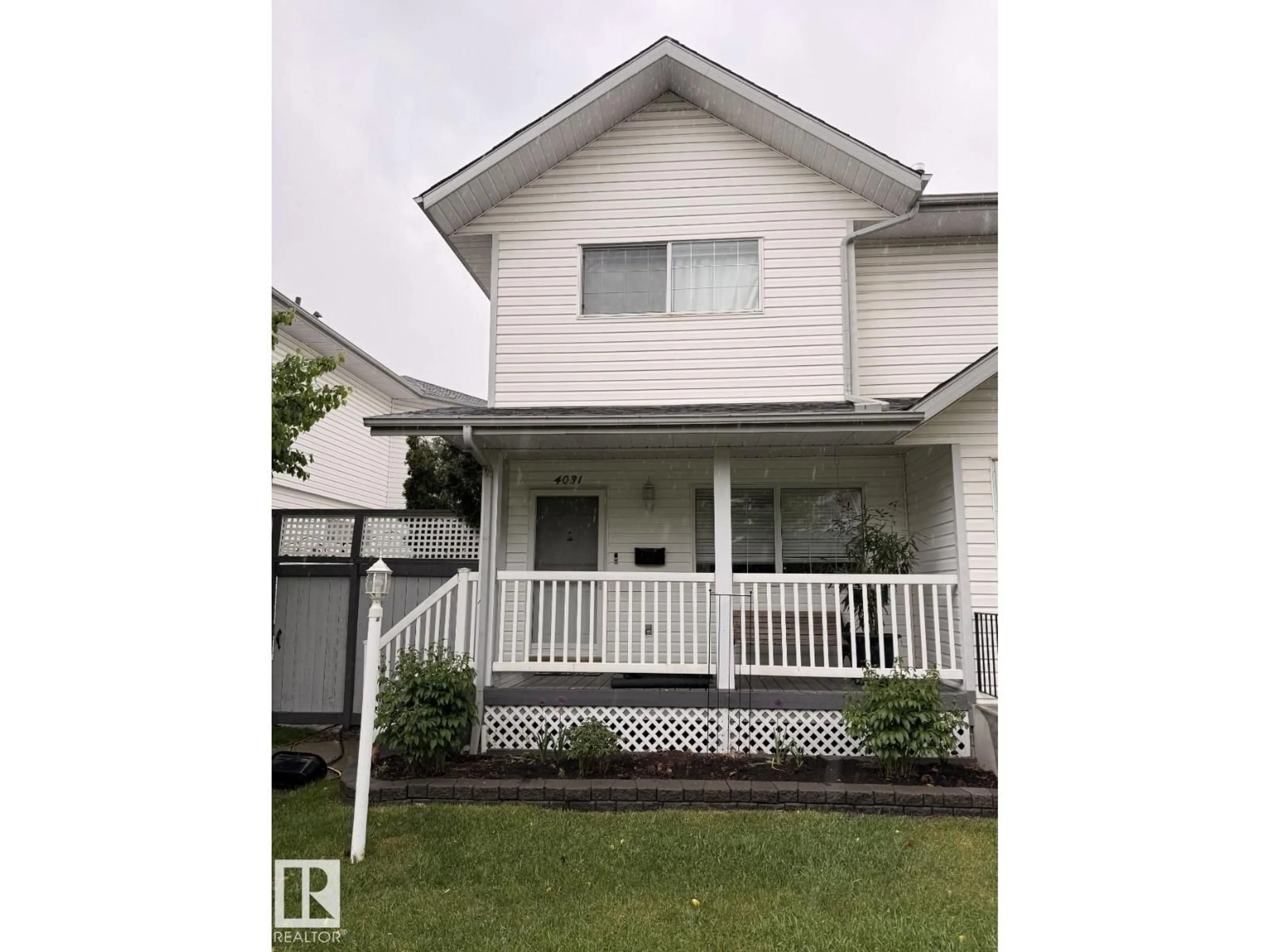 Home with vinyl exterior material, street for NW - 4031 38 STREET, Edmonton Alberta T6L6W8