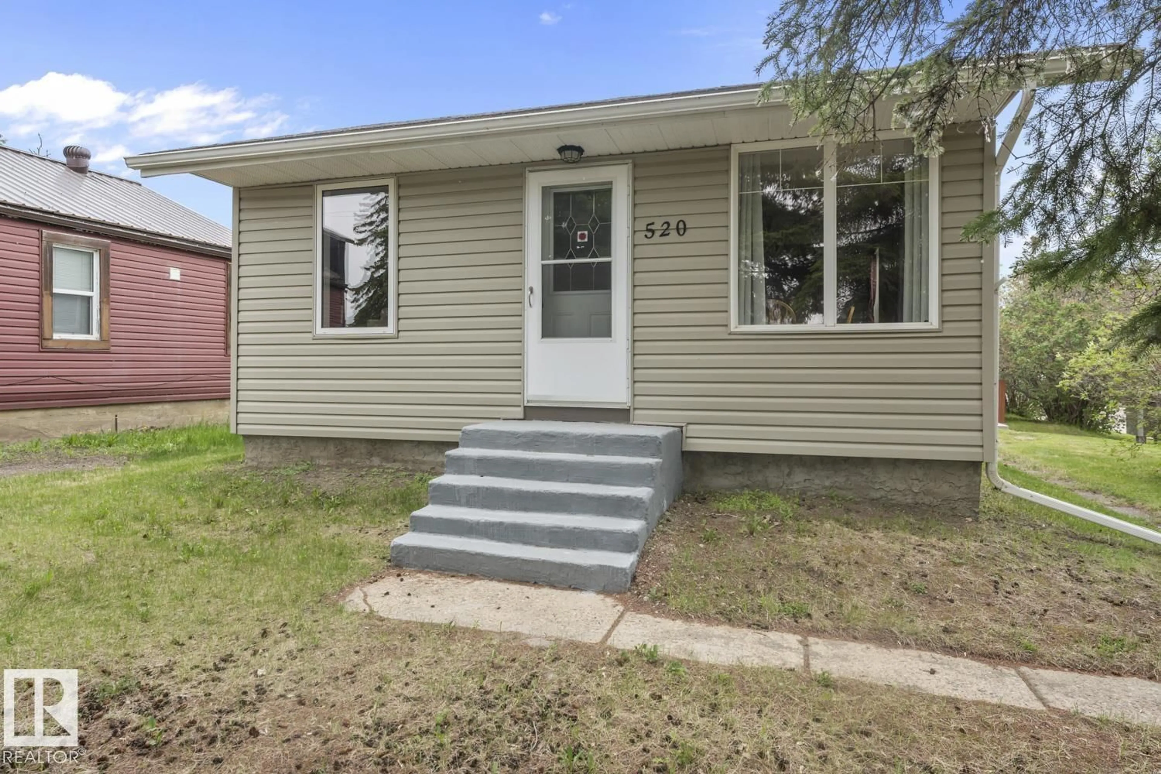 Home with vinyl exterior material, street for 520 10 ST, Cold Lake Alberta T9M1A2