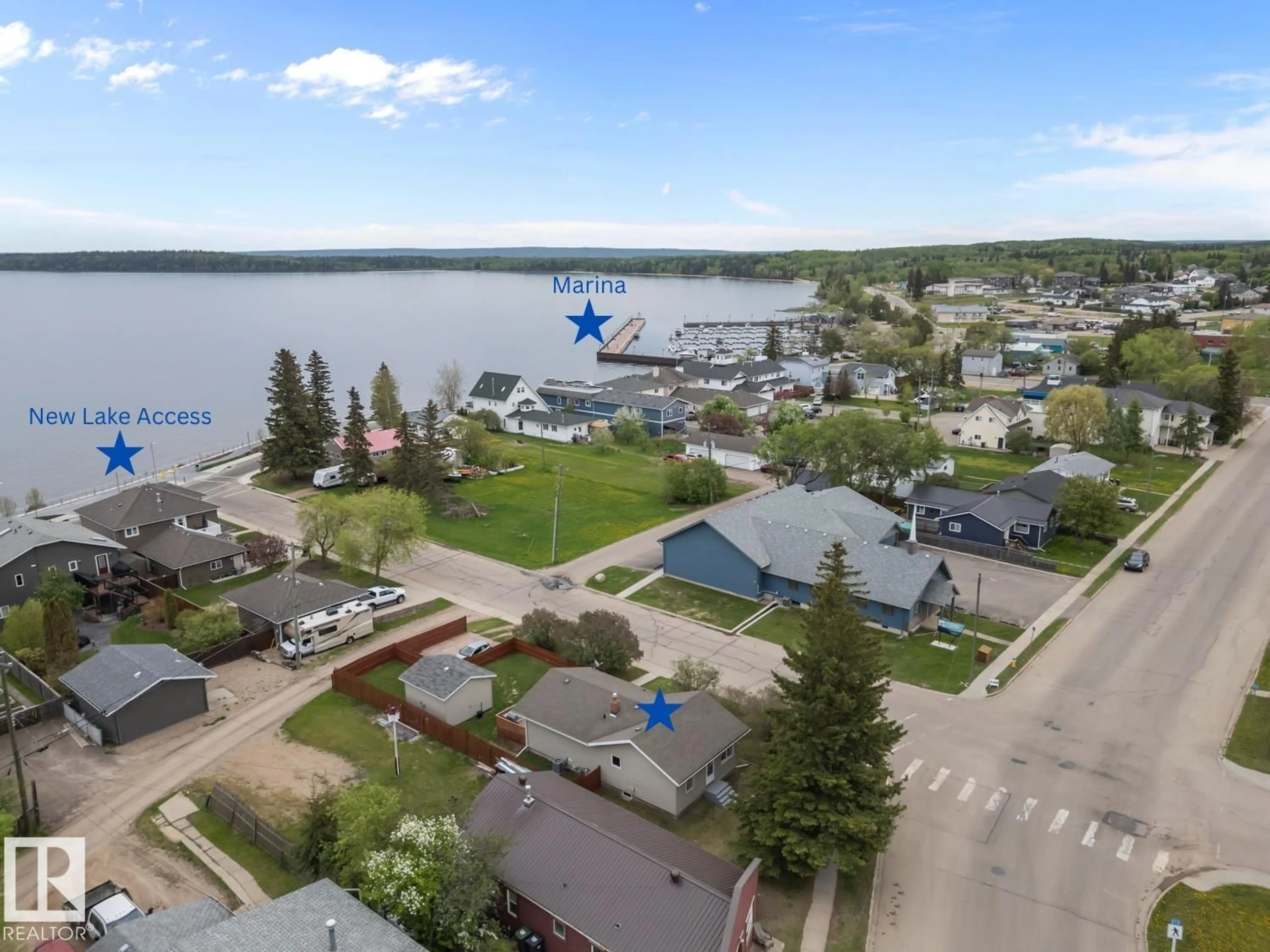A pic from outside/outdoor area/front of a property/back of a property/a pic from drone, water/lake/river/ocean view for 520 10 ST, Cold Lake Alberta T9M1A2