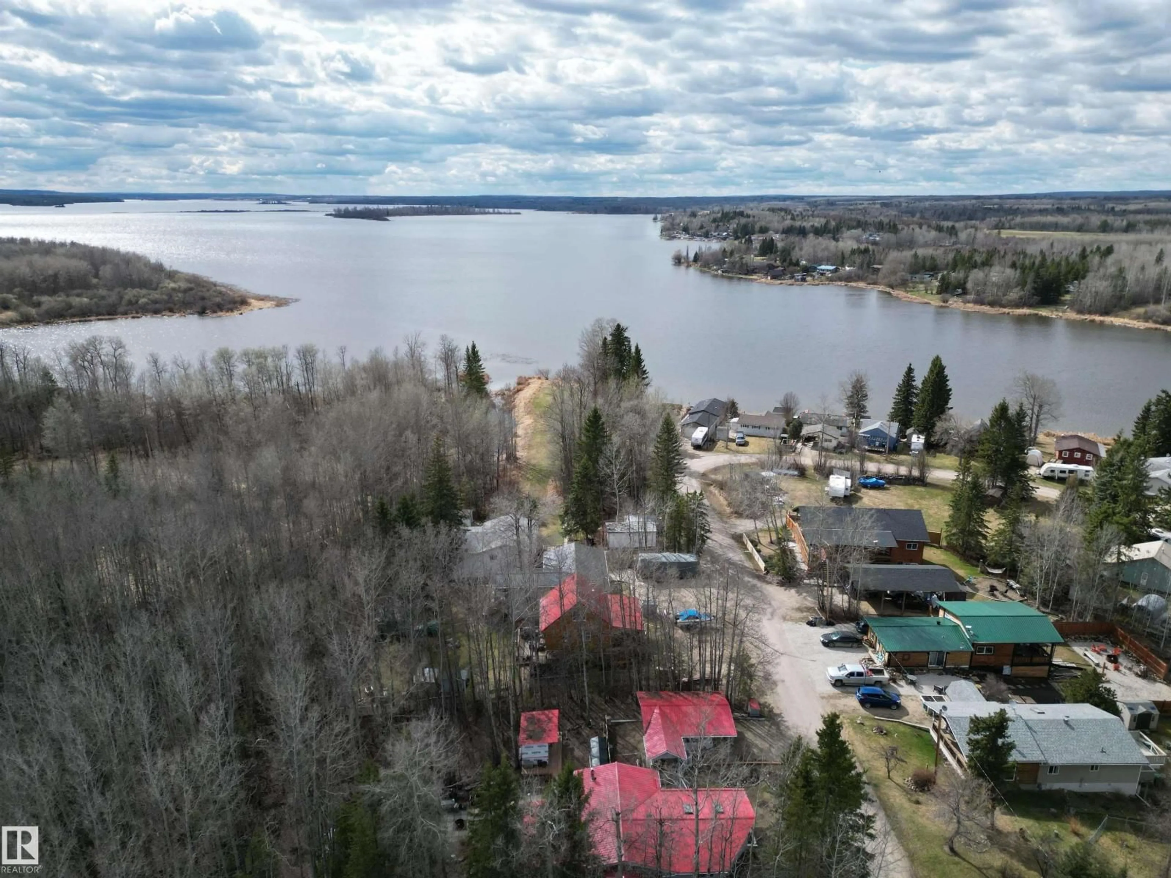 A pic from outside/outdoor area/front of a property/back of a property/a pic from drone, water/lake/river/ocean view for 54114 RGE ROAD 52, Rural Lac Ste. Anne County Alberta T0E1H0