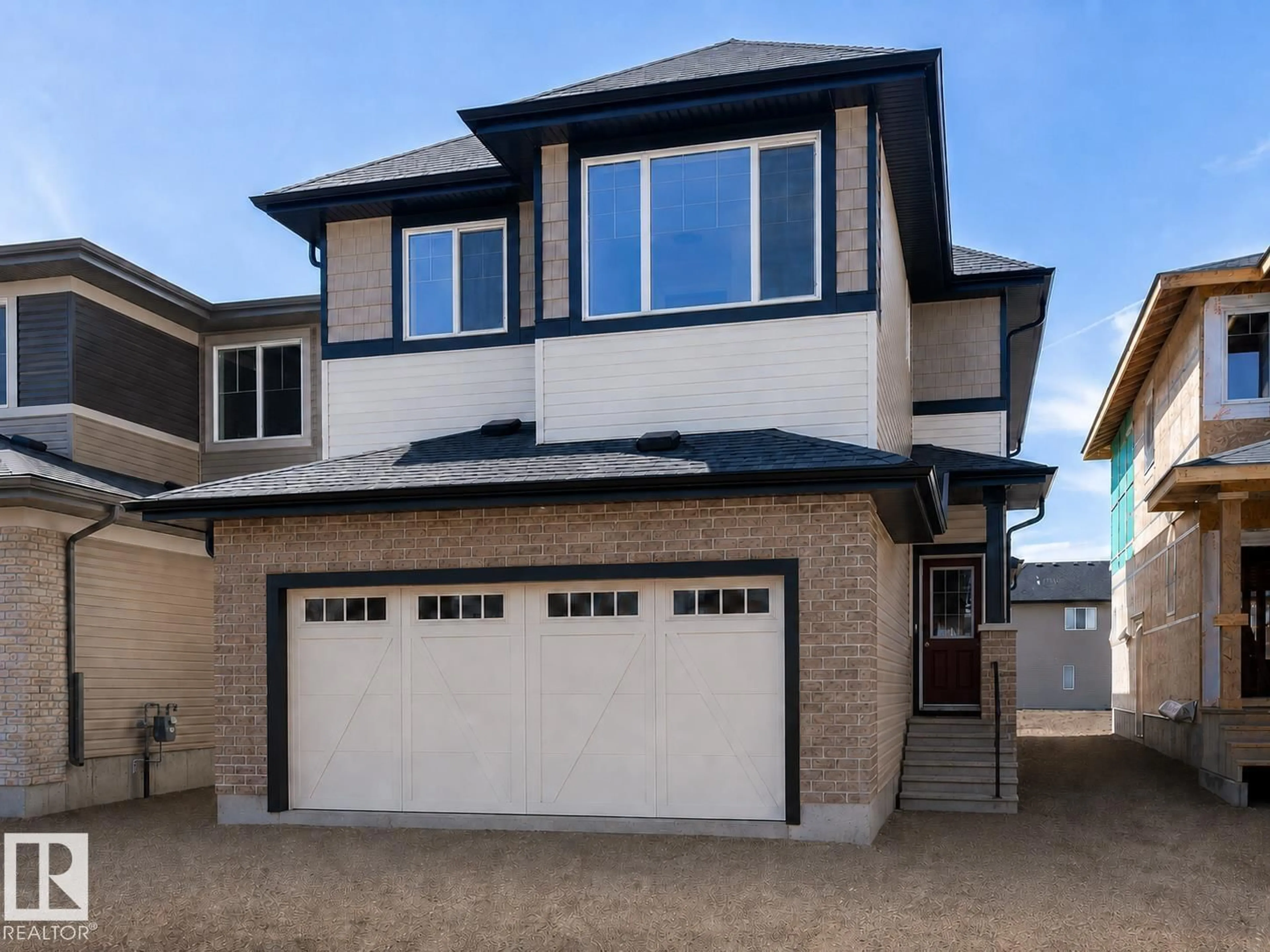 Home with vinyl exterior material, street for 6275 180 AV, Edmonton Alberta T5Y3X1