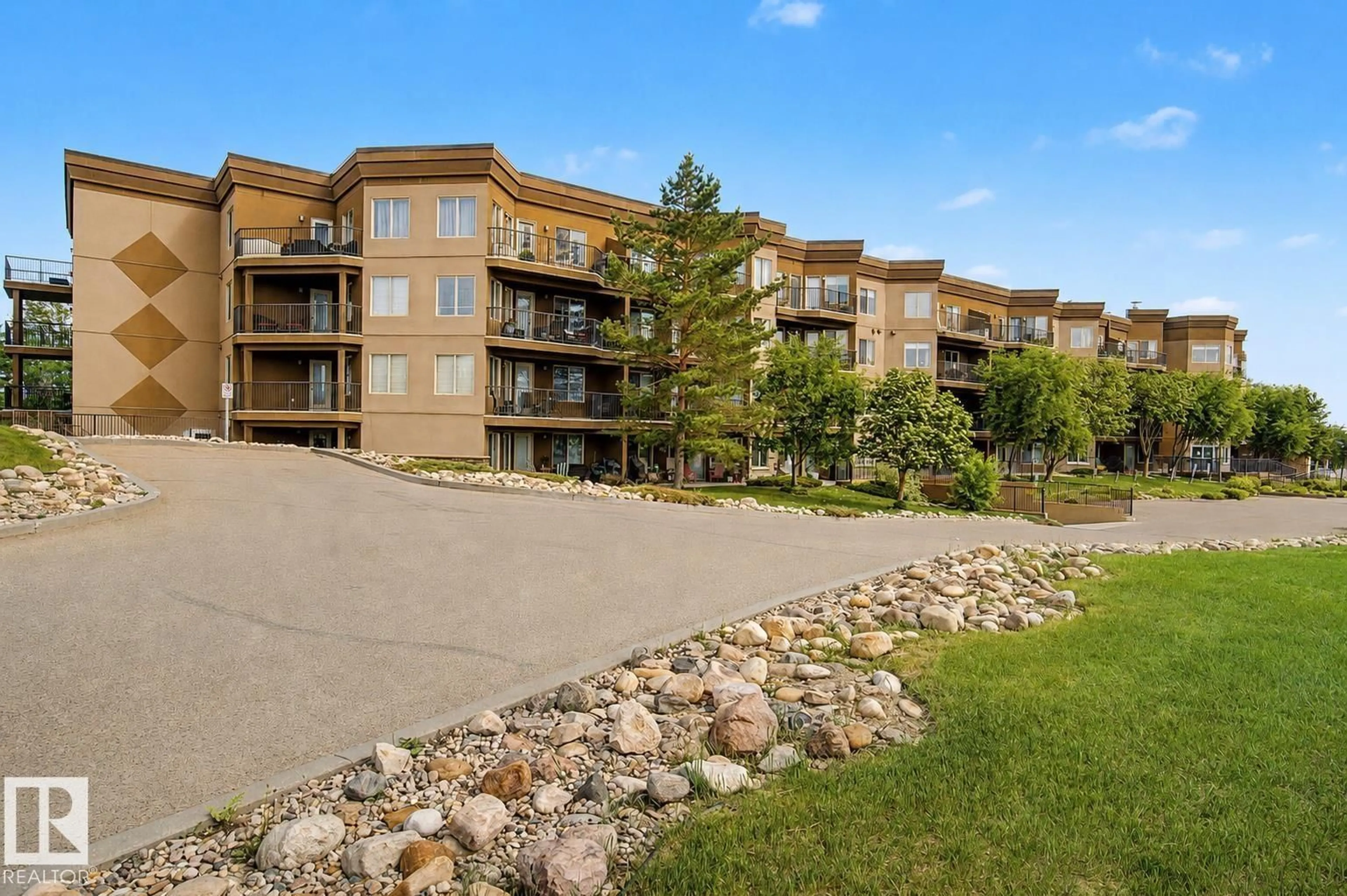 A pic from outside/outdoor area/front of a property/back of a property/a pic from drone, water/lake/river/ocean view for #303 - 530 HOOKE RD, Edmonton Alberta T5A5J5