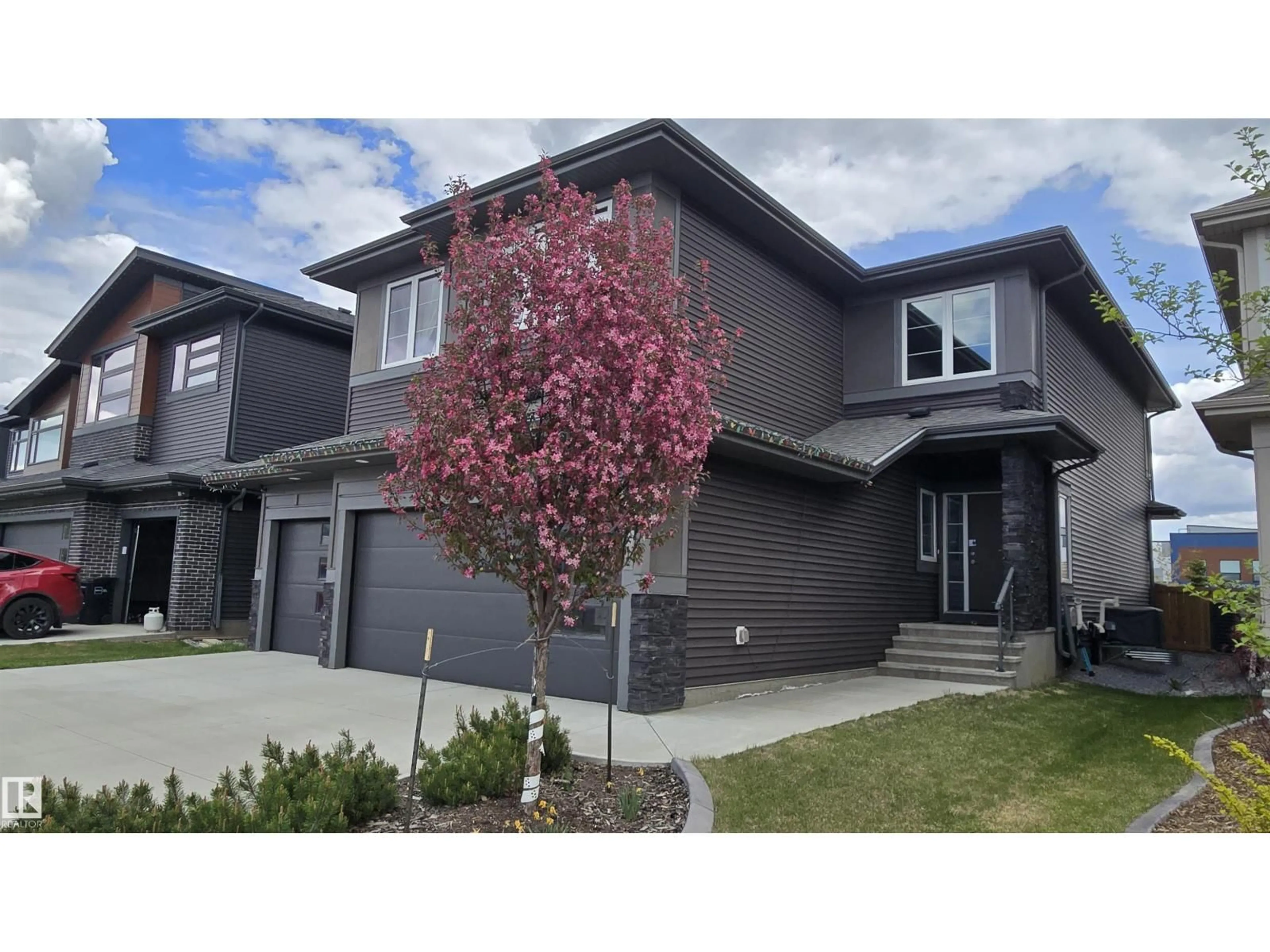 Home with vinyl exterior material, street for 6621 KNOX PL, Edmonton Alberta T6W4R1