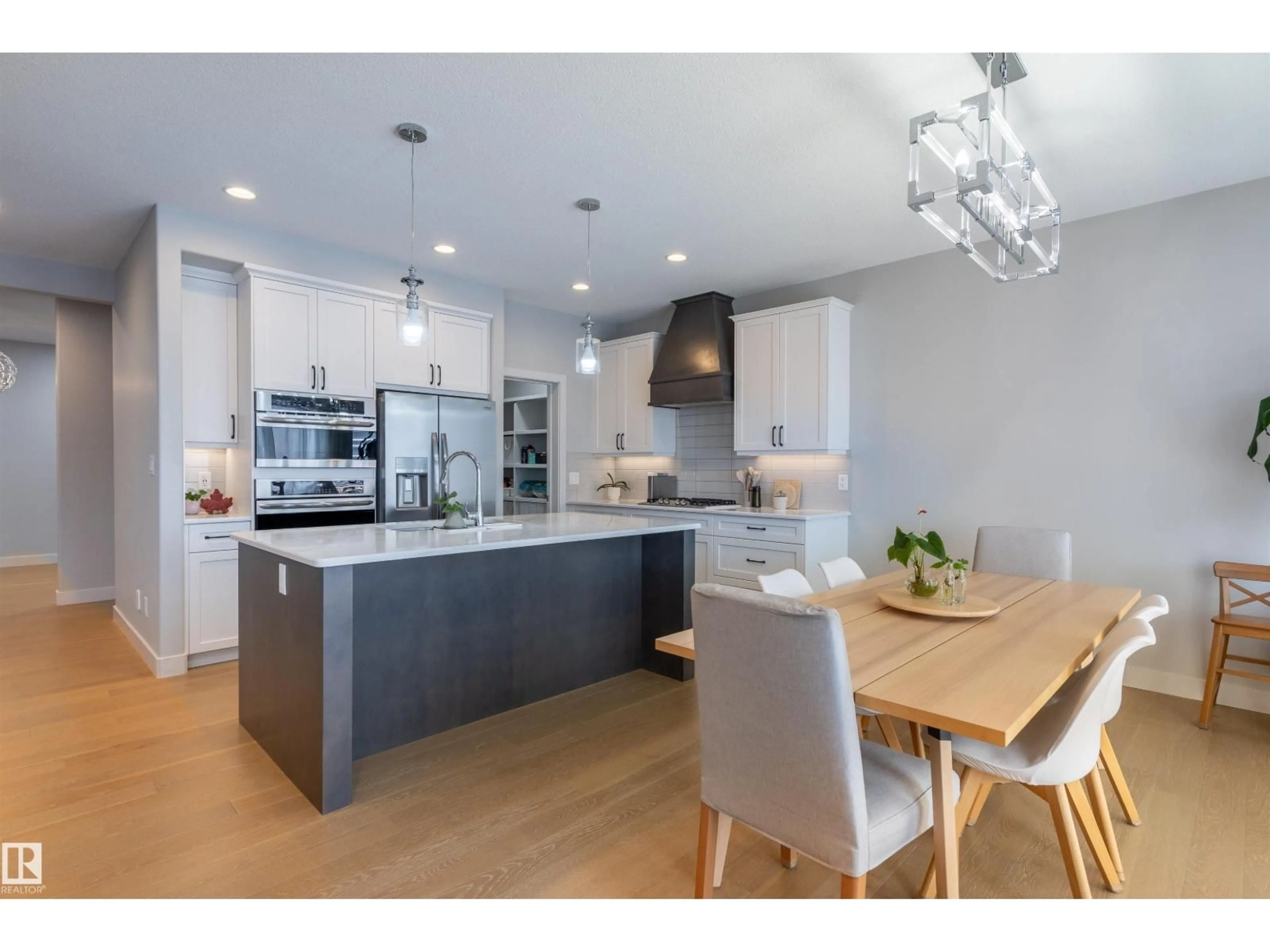 Open concept kitchen, wood/laminate floor for 6621 KNOX PL, Edmonton Alberta T6W4R1