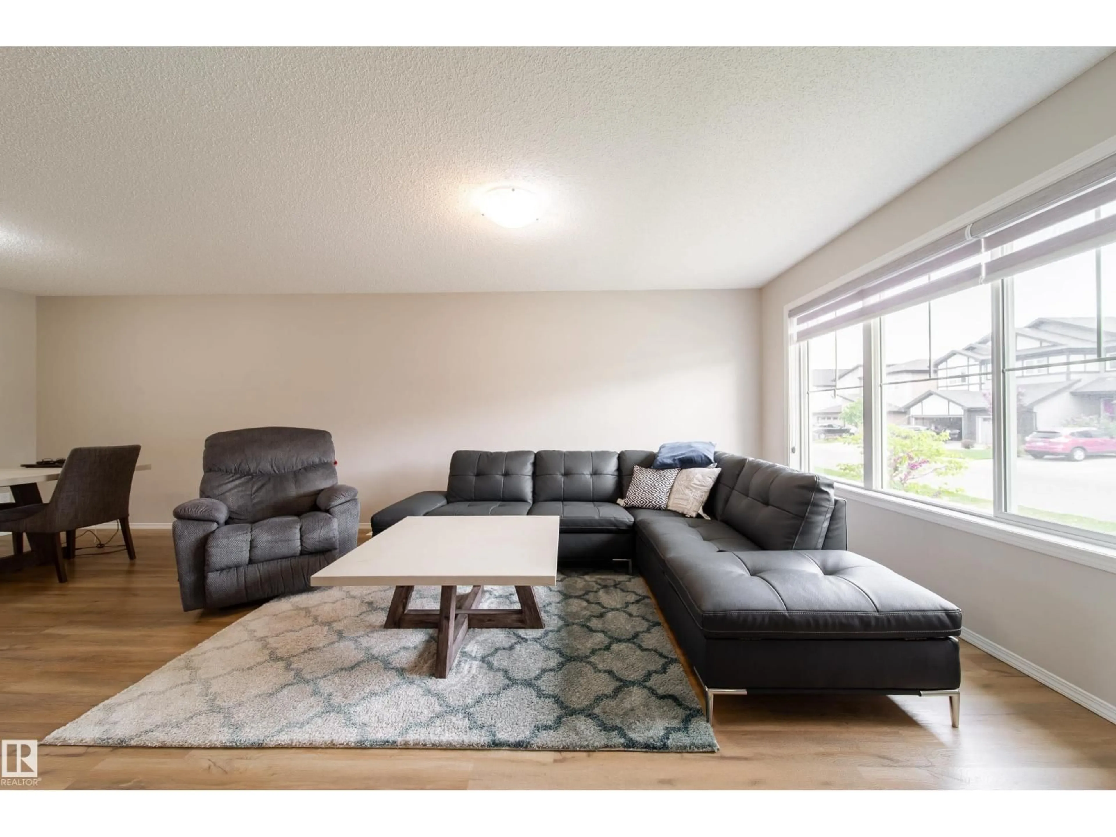 Living room with furniture, unknown for SW SW - 3038 CHECKNITA WY, Edmonton Alberta T6W3X8
