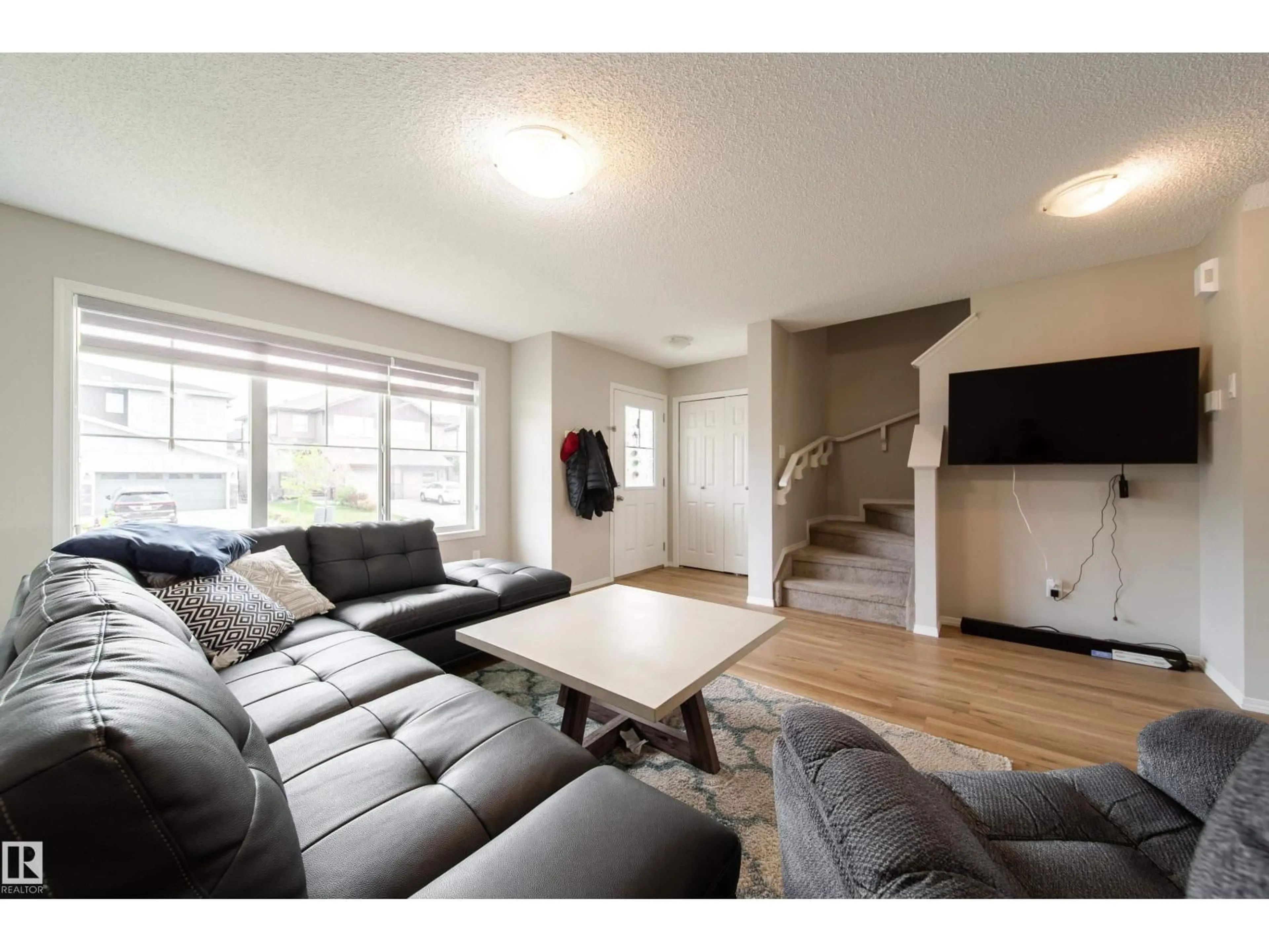 Living room with furniture, unknown for SW SW - 3038 CHECKNITA WY, Edmonton Alberta T6W3X8