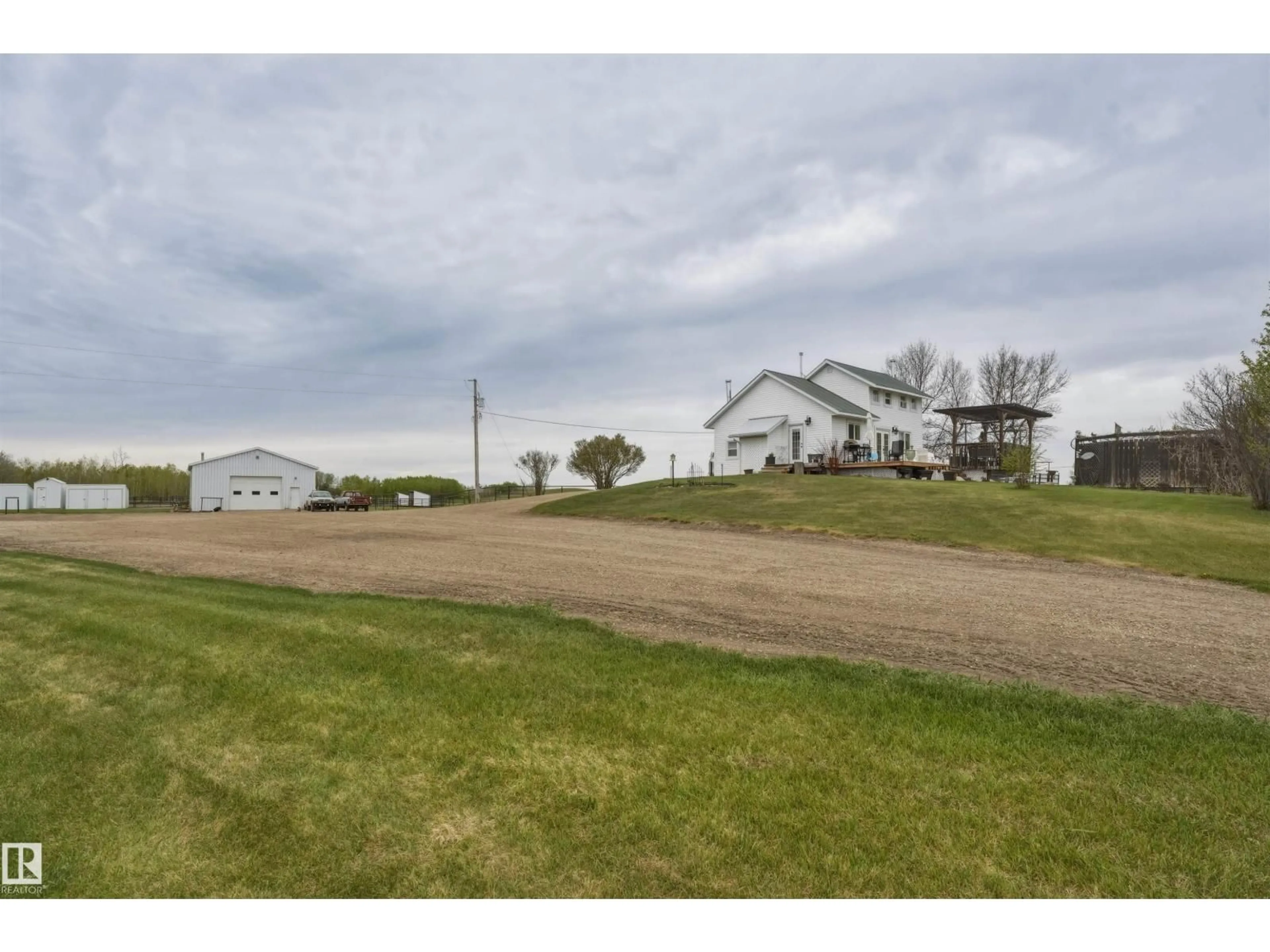 A pic from outside/outdoor area/front of a property/back of a property/a pic from drone, unknown for 56502 RGE ROAD 33, Rural Lac Ste. Anne County Alberta T0E1V0
