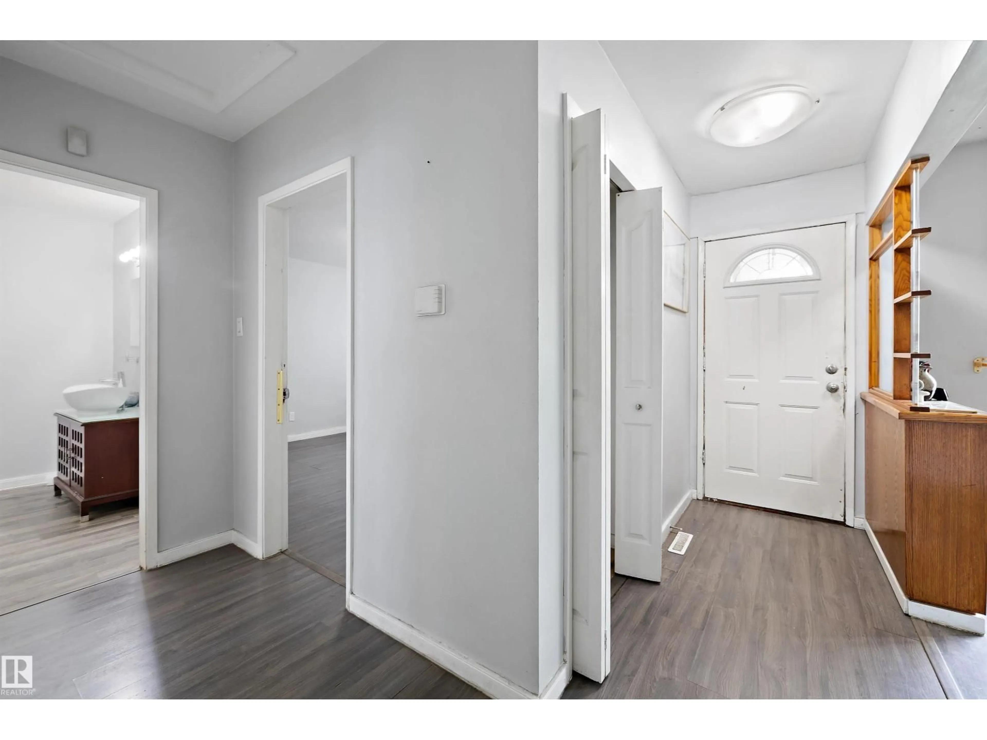 Indoor entryway for 12303 115 AV, Edmonton Alberta T5H2Z7