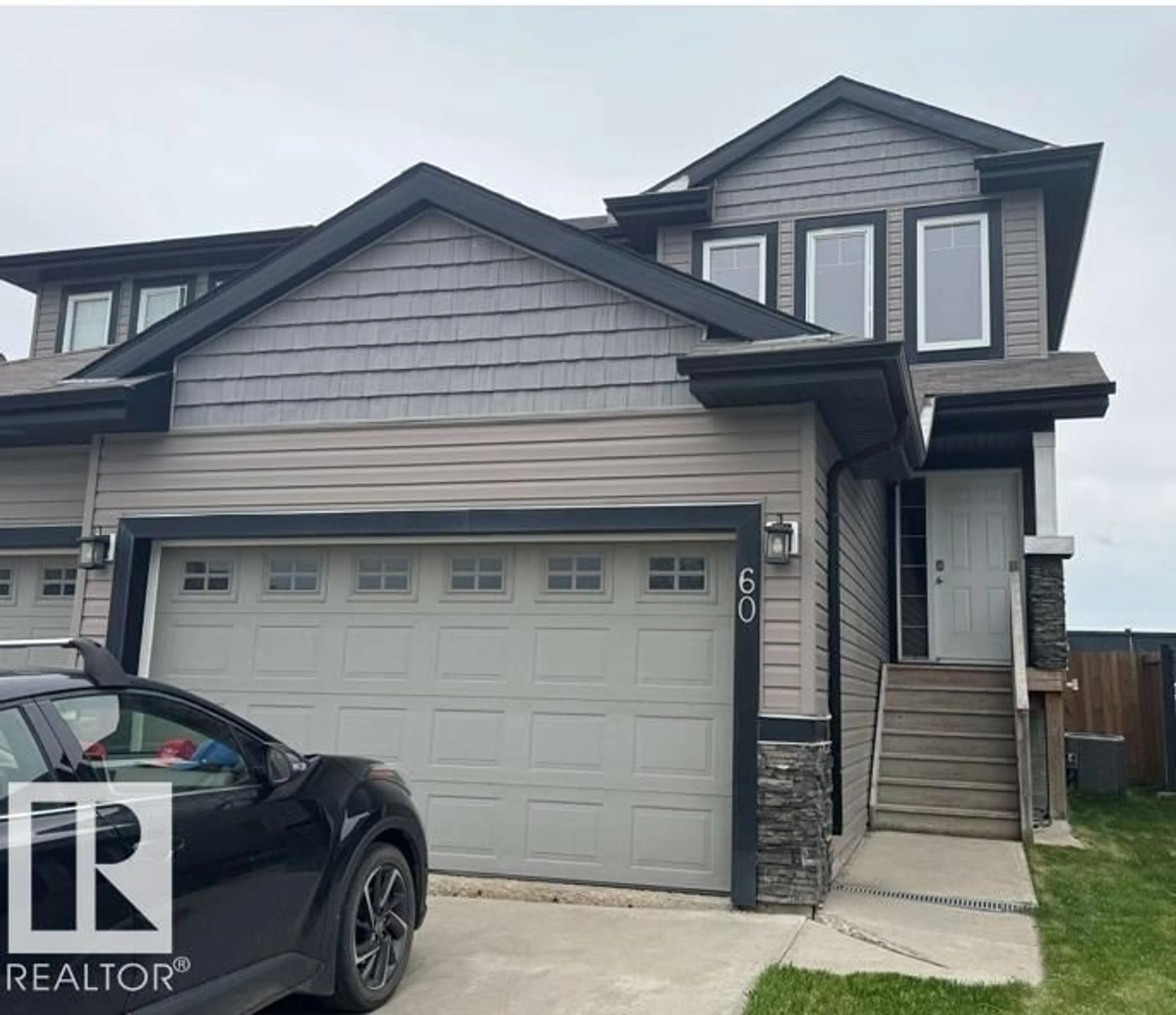 Home with vinyl exterior material, street for 60 DUNLOP WD, Leduc Alberta T9E0N3