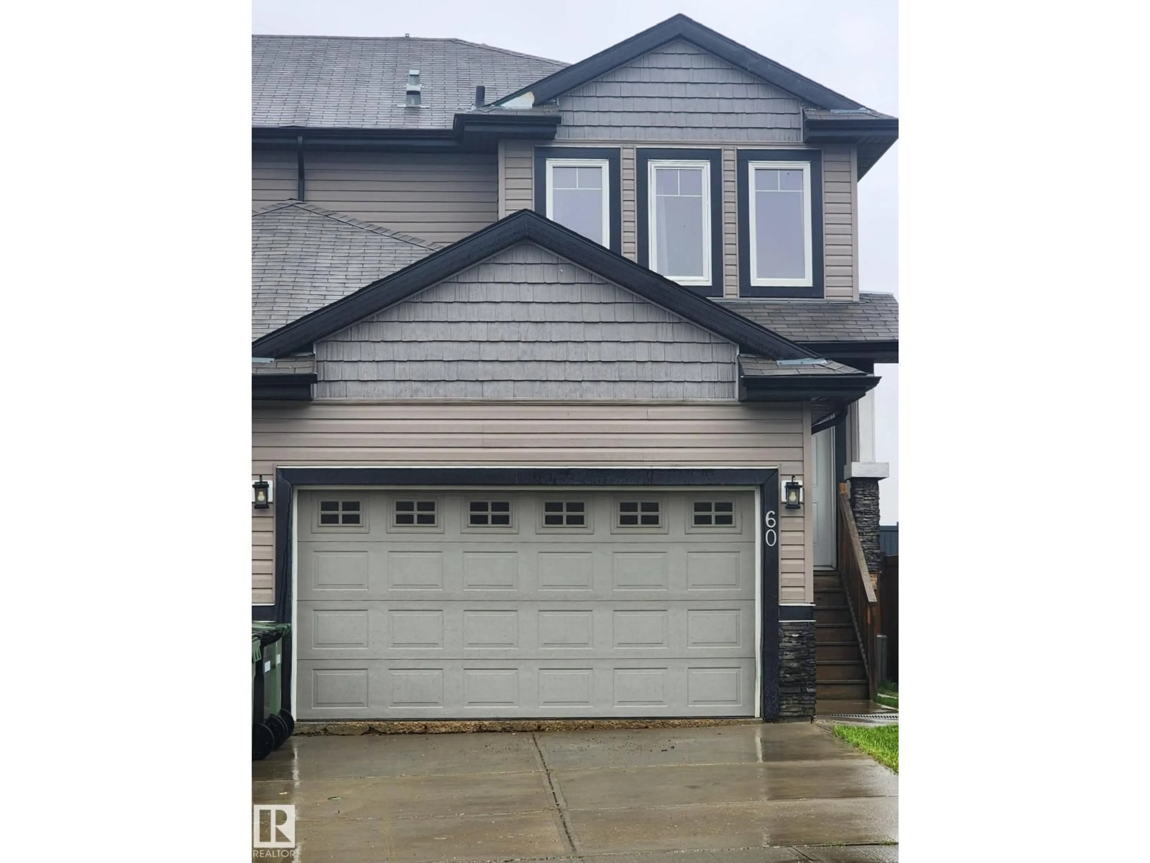 Home with vinyl exterior material, street for 60 DUNLOP WD, Leduc Alberta T9E0N3