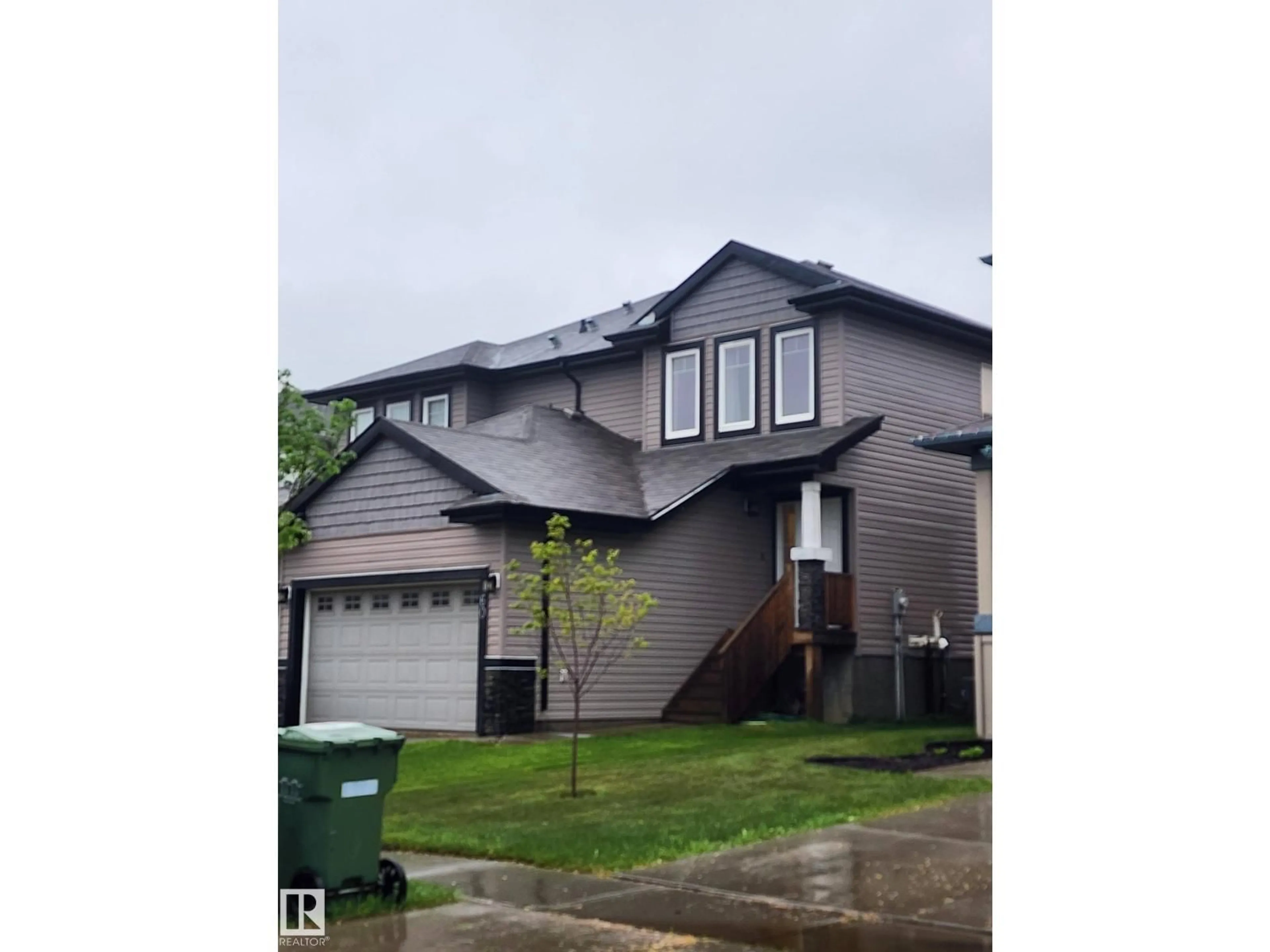 Home with vinyl exterior material, street for 60 DUNLOP WD, Leduc Alberta T9E0N3