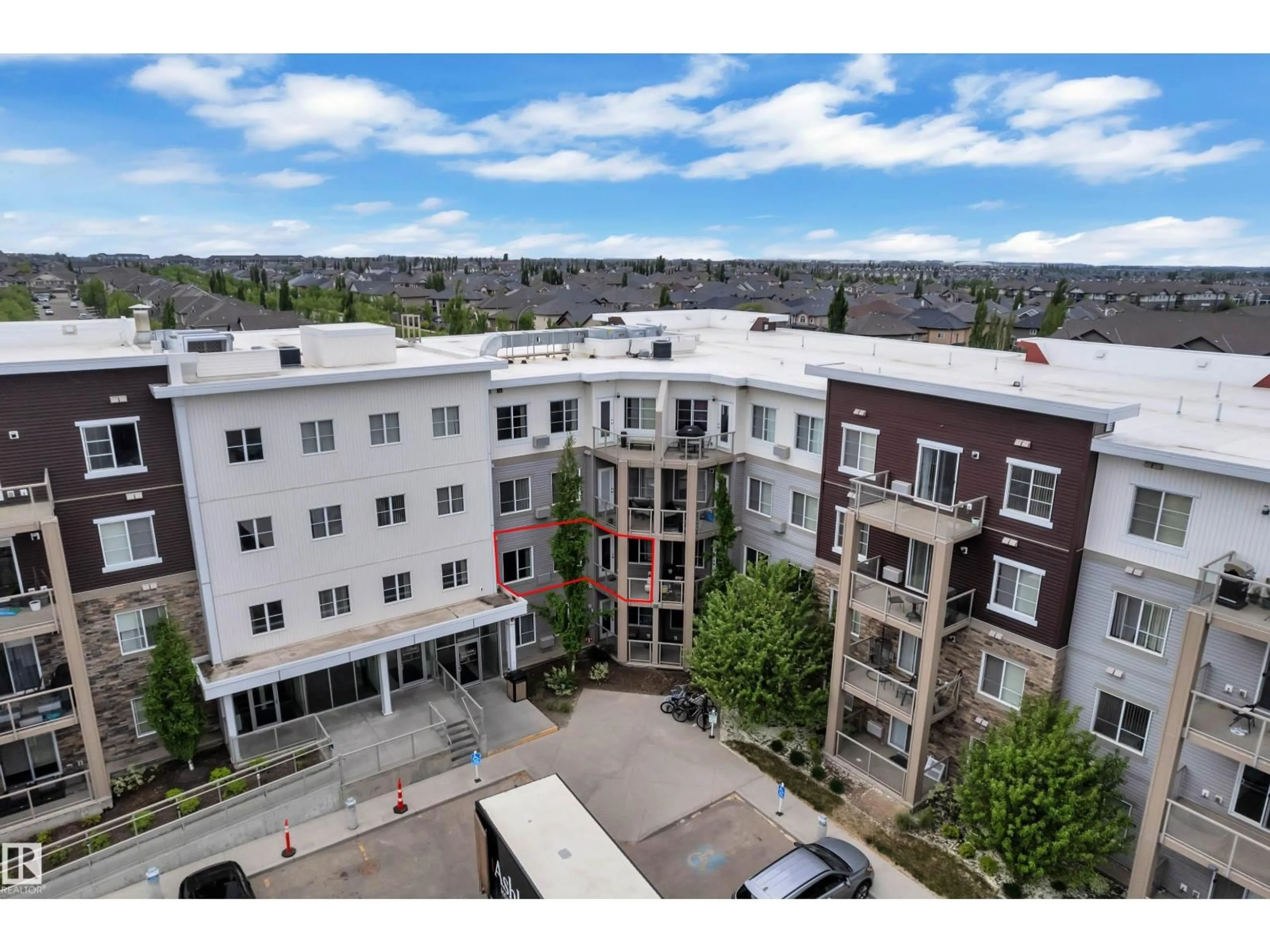 A pic from outside/outdoor area/front of a property/back of a property/a pic from drone, city buildings view from balcony for #214 - 812 WELSH DR, Edmonton Alberta T6X1Y7
