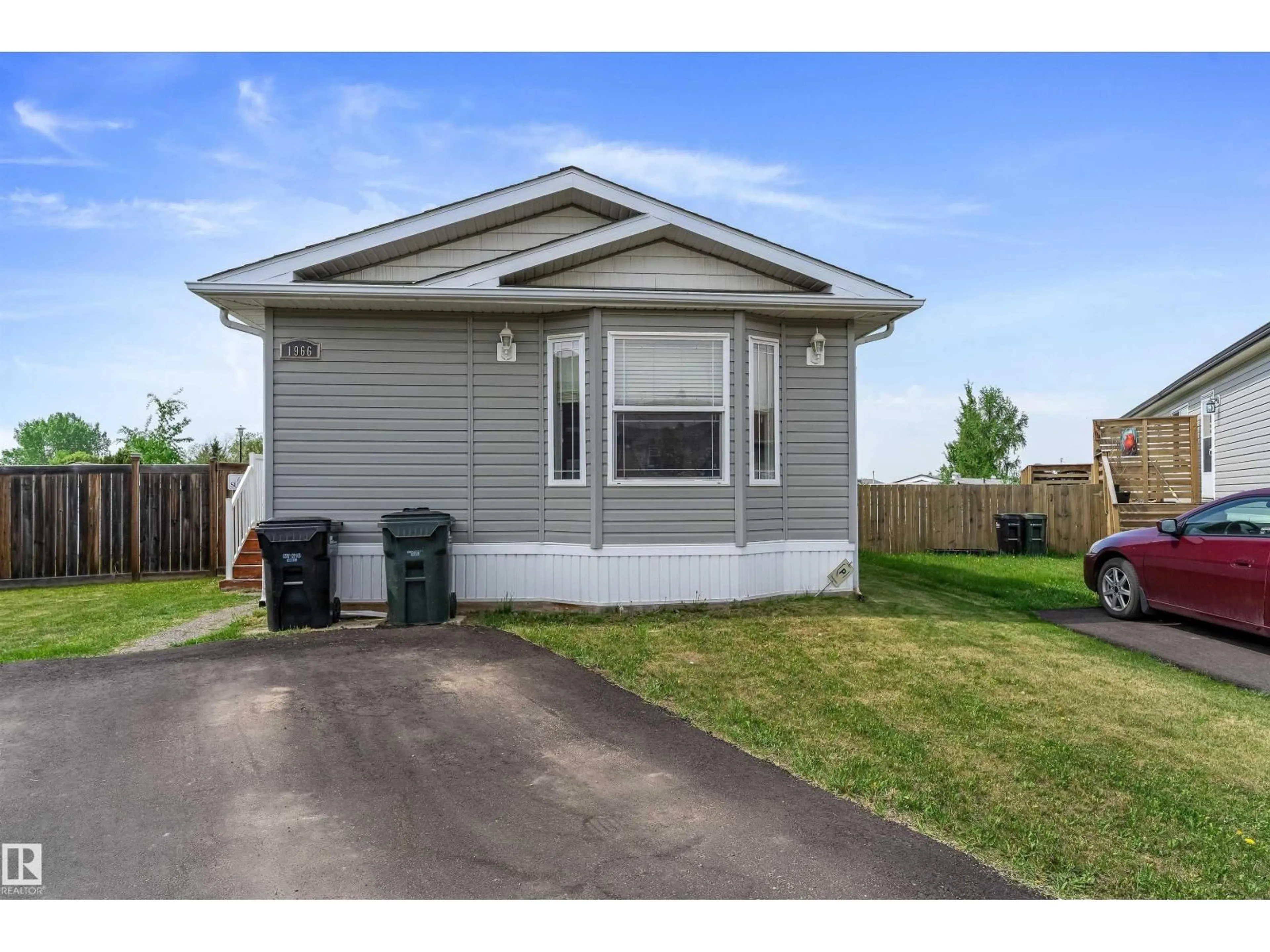 Home with vinyl exterior material, street for 1966 JUBILEE PL, Sherwood Park Alberta T8H2N9