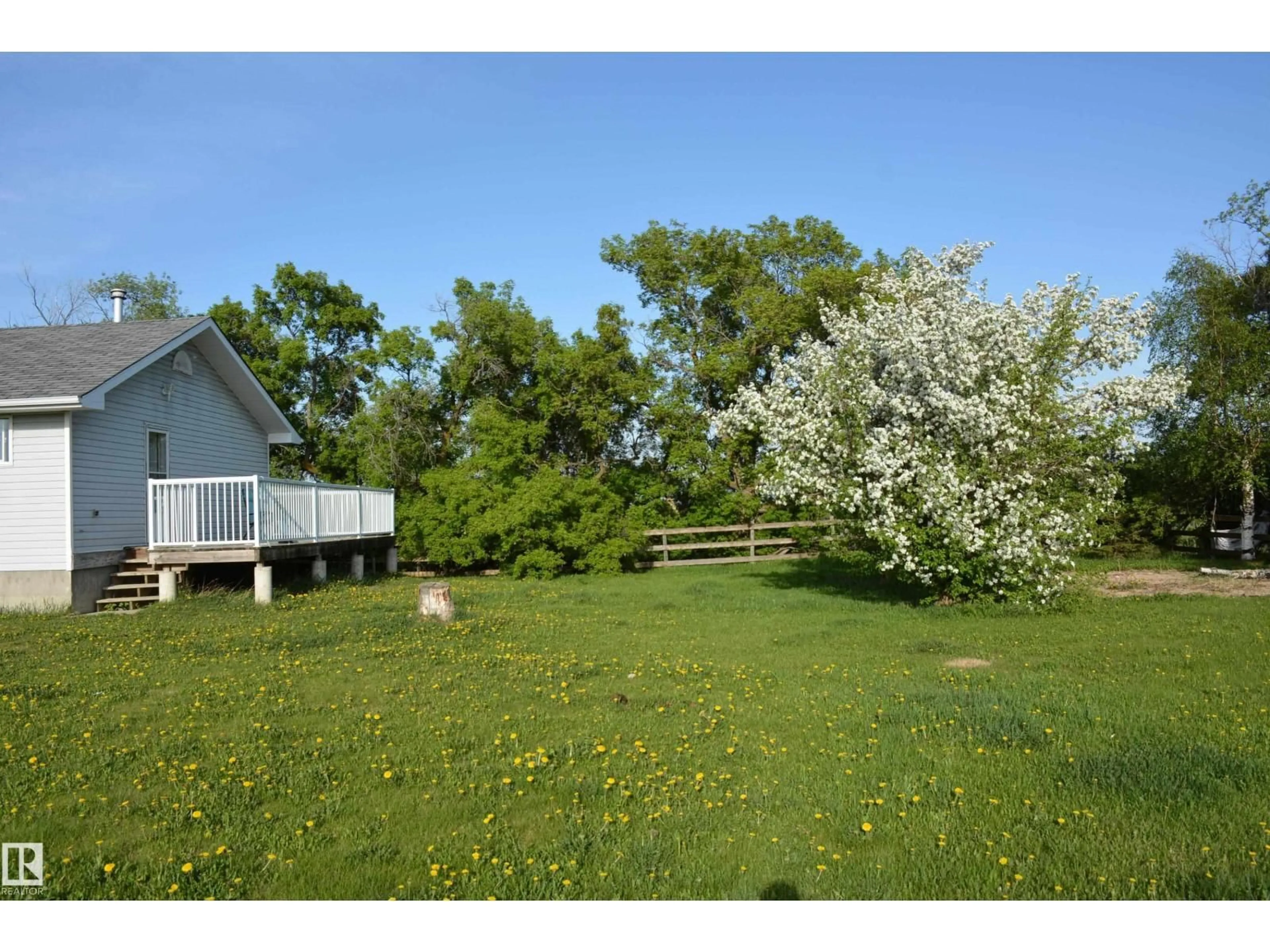 A pic from outside/outdoor area/front of a property/back of a property/a pic from drone, water/lake/river/ocean view for 59032 RGE RD 40, Rural Barrhead County Alberta T0G1R1