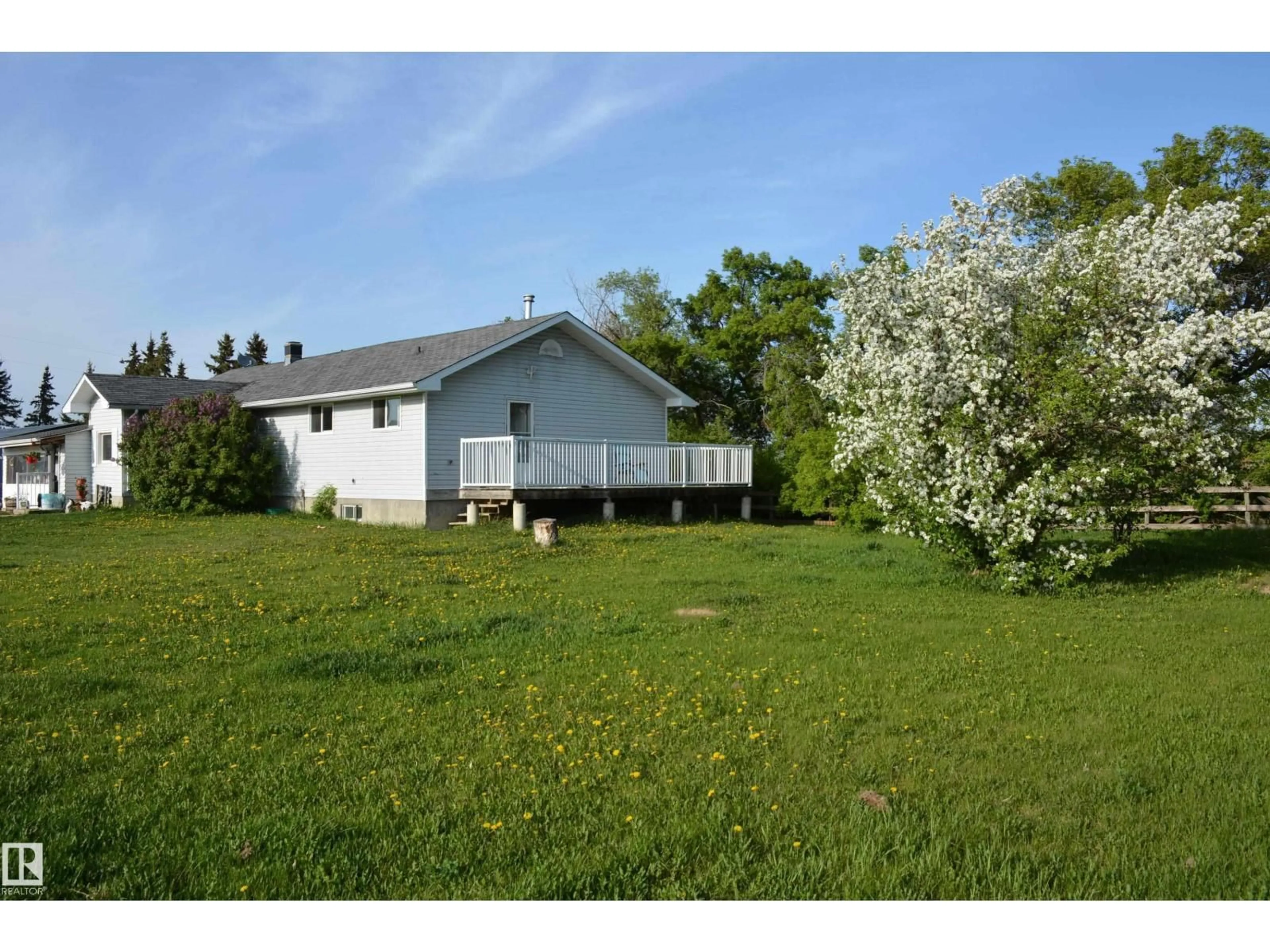 A pic from outside/outdoor area/front of a property/back of a property/a pic from drone, water/lake/river/ocean view for 59032 RGE RD 40, Rural Barrhead County Alberta T0G1R1