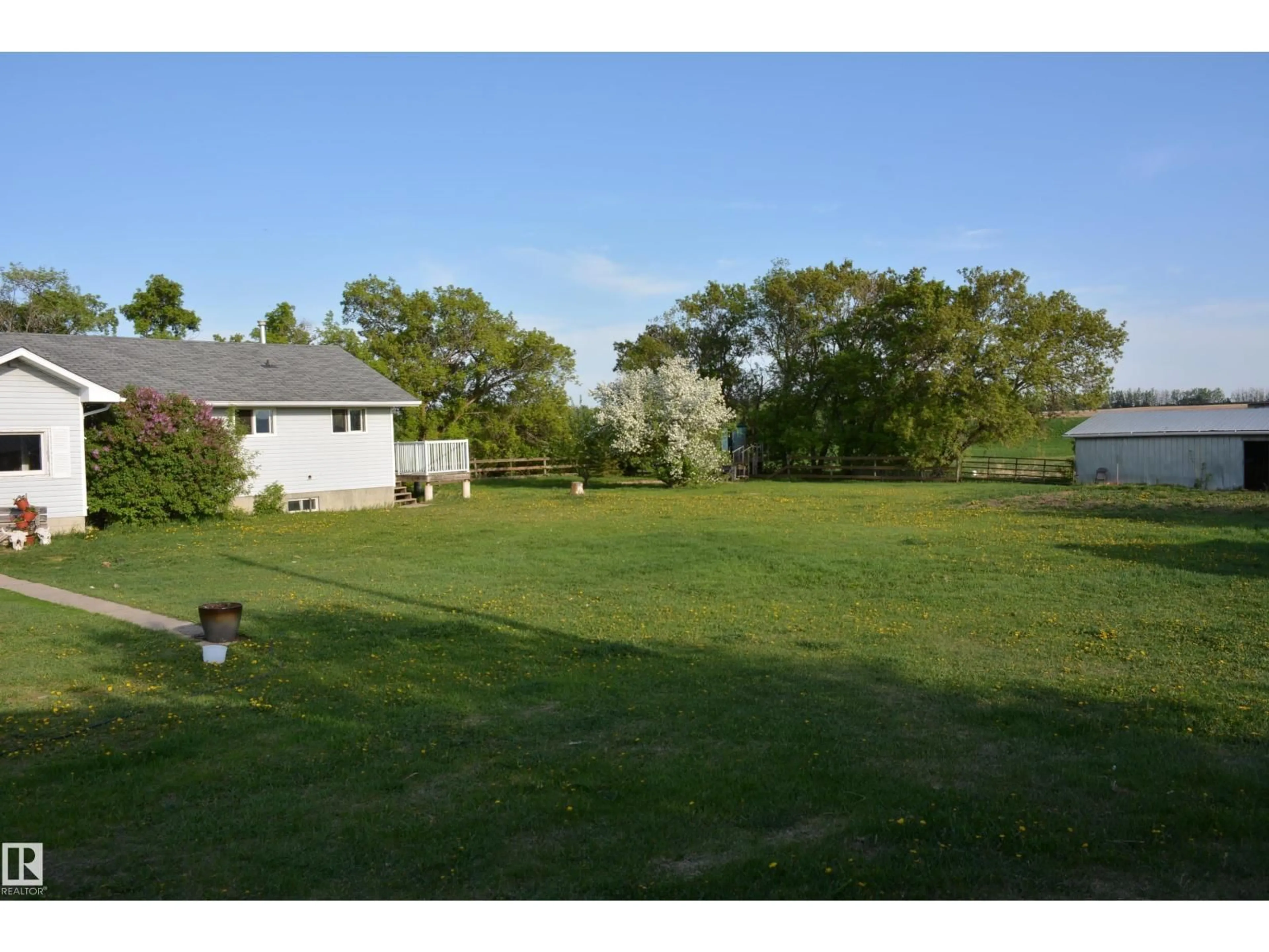 A pic from outside/outdoor area/front of a property/back of a property/a pic from drone, water/lake/river/ocean view for 59032 RGE RD 40, Rural Barrhead County Alberta T0G1R1