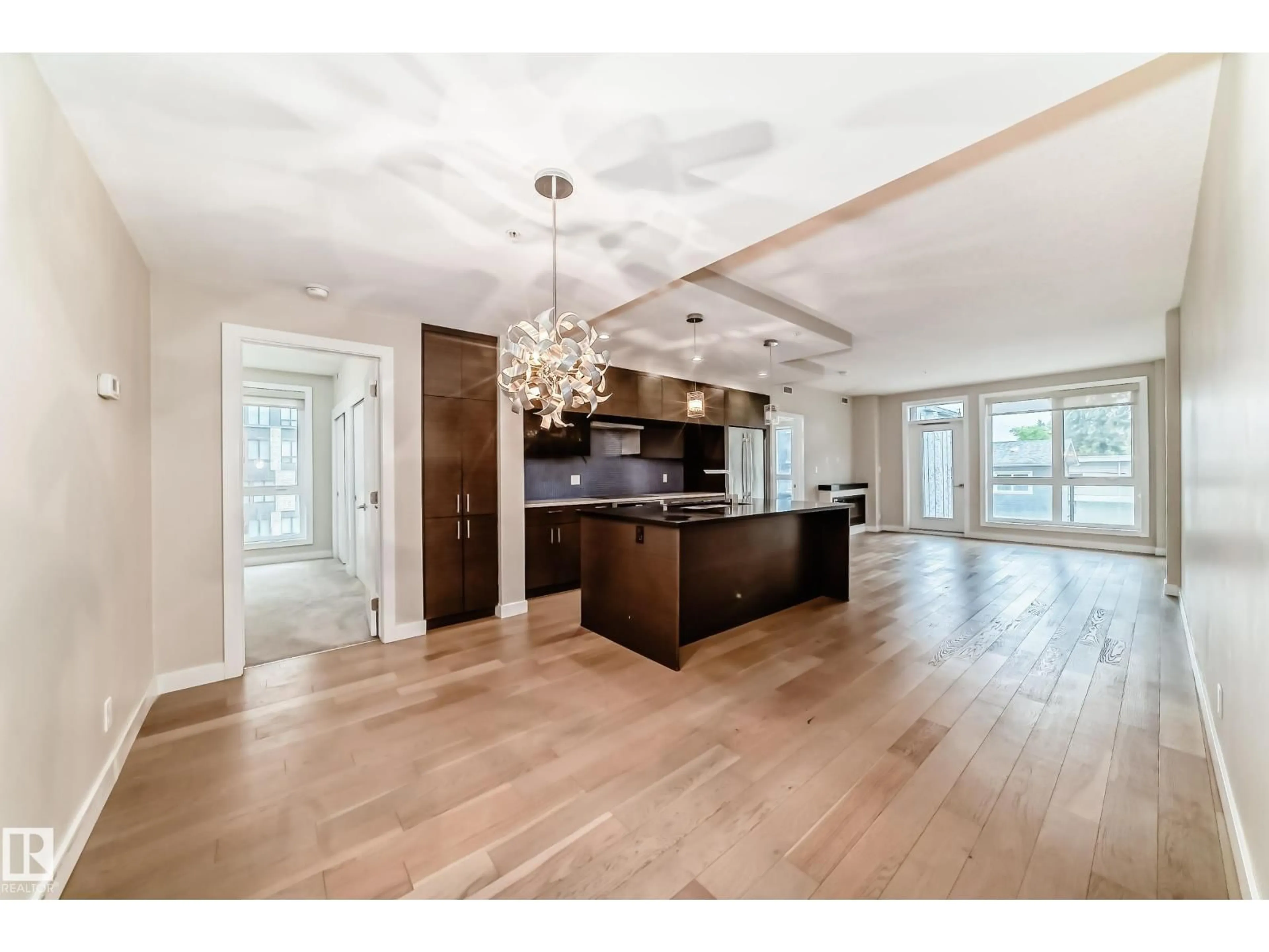 Open concept kitchen, wood/laminate floor for 207 - 11710 87 AV, Edmonton Alberta T6G0Y3