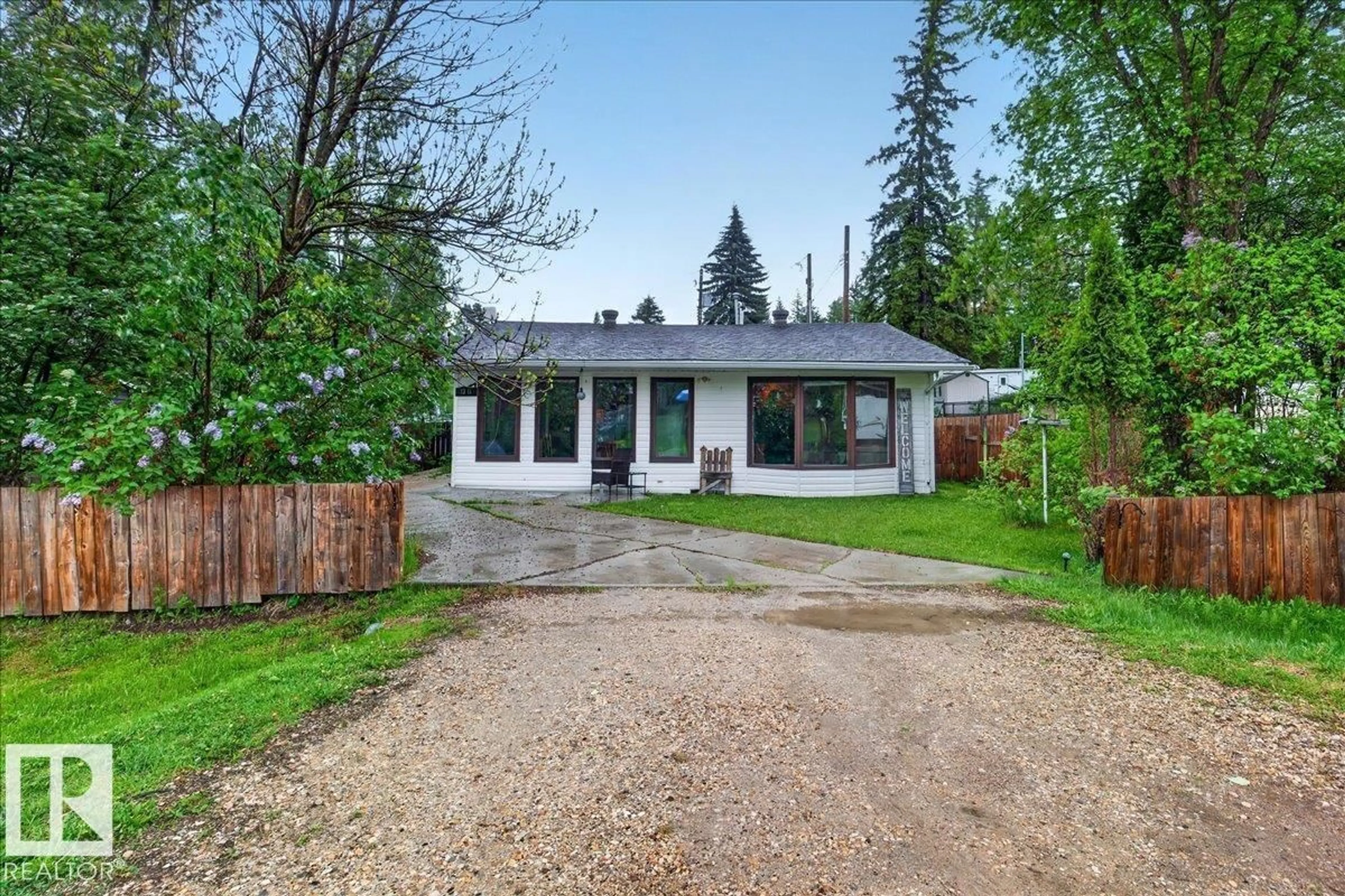 A pic from outside/outdoor area/front of a property/back of a property/a pic from drone, street for 1311 PARK CR, Rural Lac Ste. Anne County Alberta T0E0A2