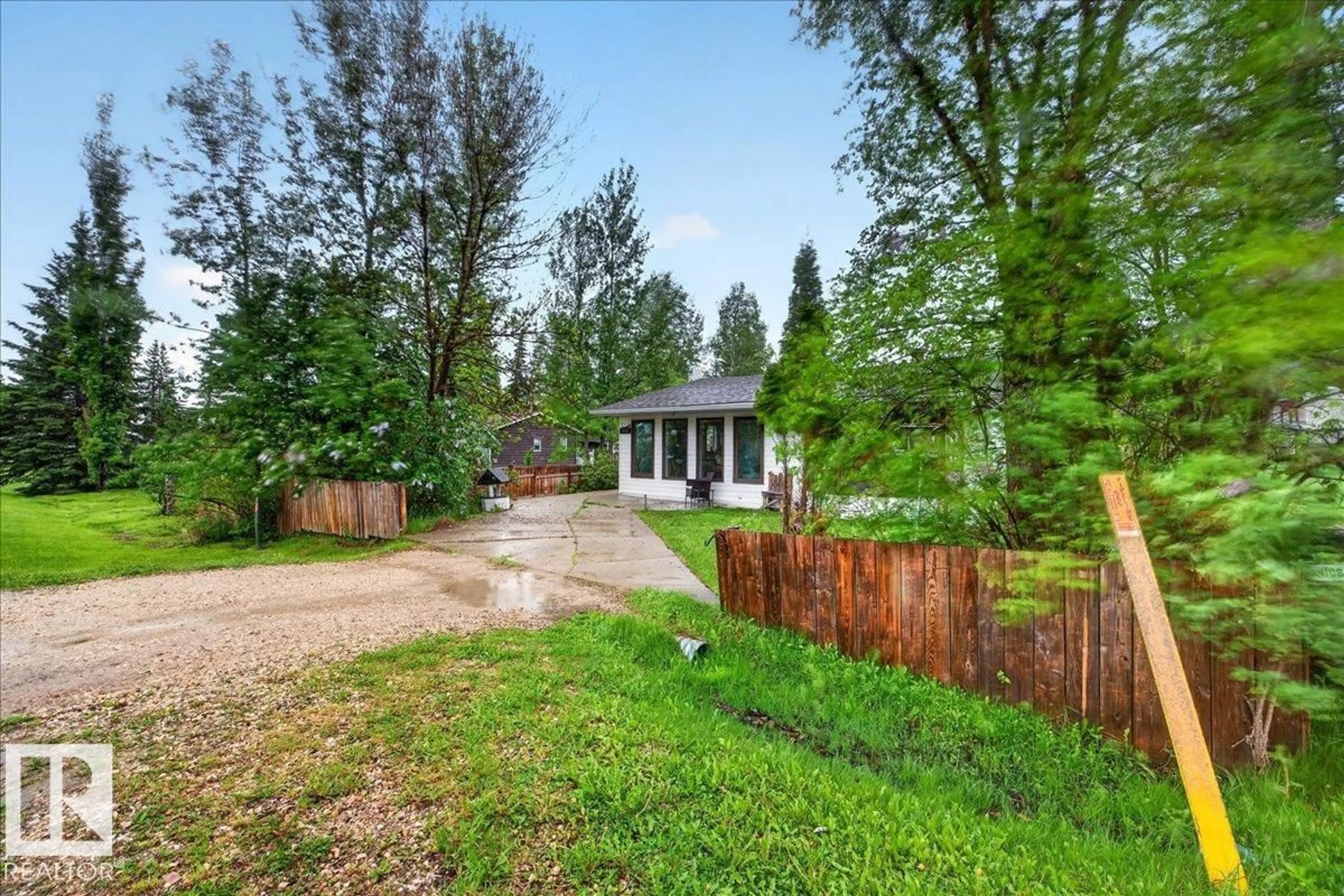 A pic from outside/outdoor area/front of a property/back of a property/a pic from drone, unknown for 1311 PARK CR, Rural Lac Ste. Anne County Alberta T0E0A2