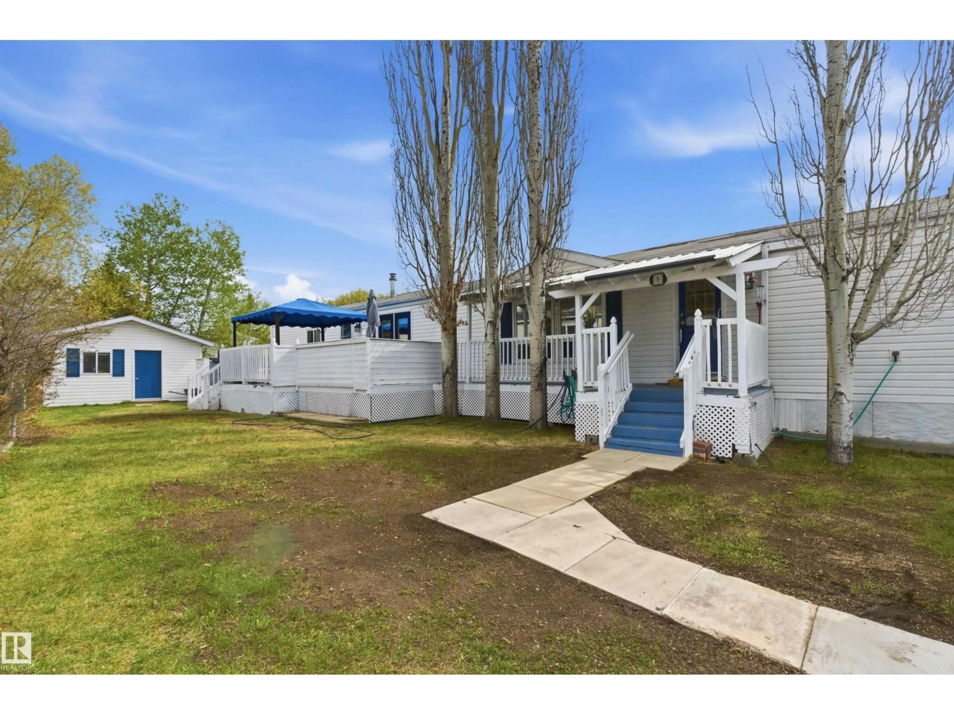A pic from outside/outdoor area/front of a property/back of a property/a pic from drone, street for 5 - 3400 48 ST, Stony Plain Alberta T7Z1R9