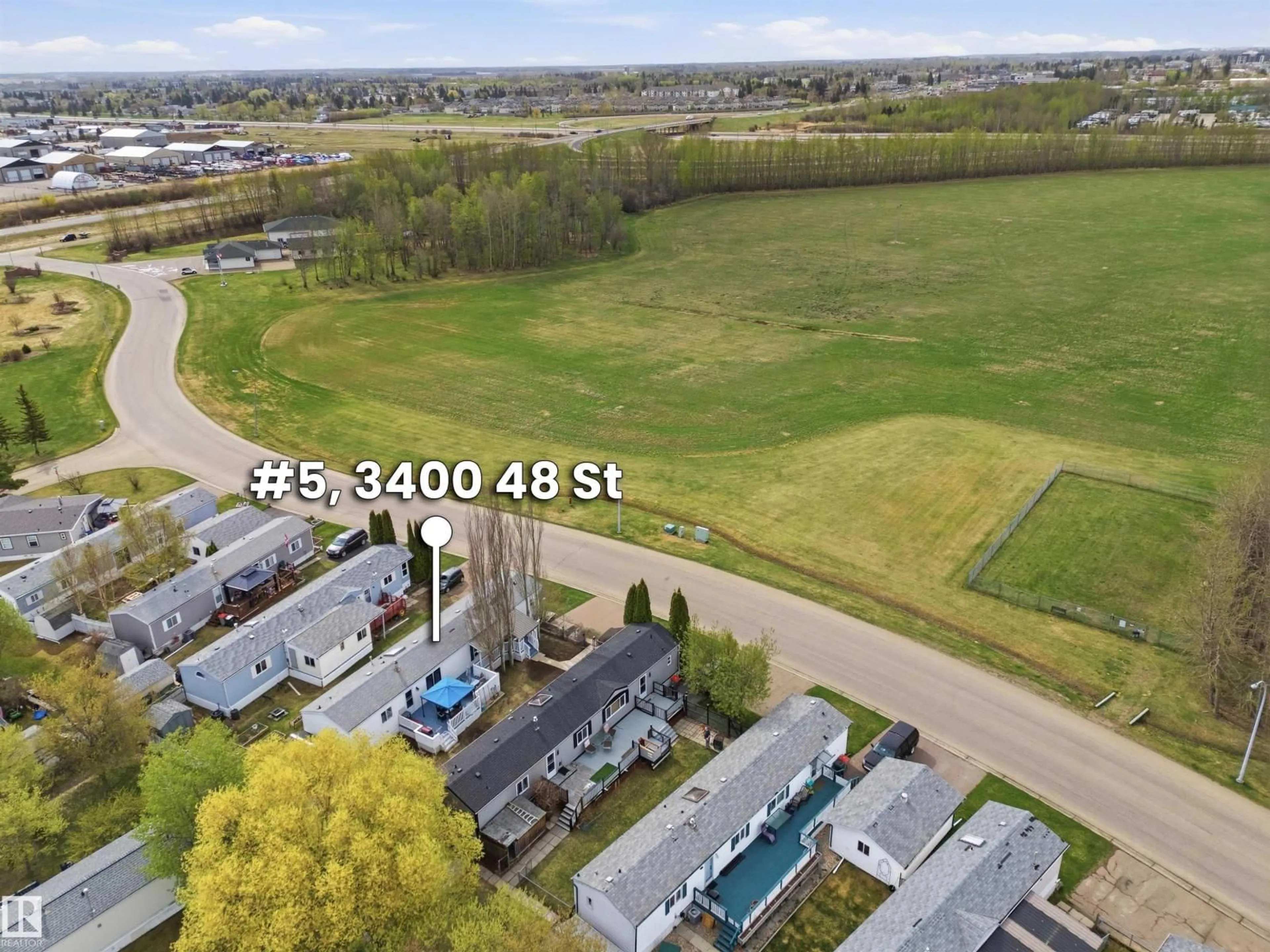 A pic from outside/outdoor area/front of a property/back of a property/a pic from drone, street for 5 - 3400 48 ST, Stony Plain Alberta T7Z1R9