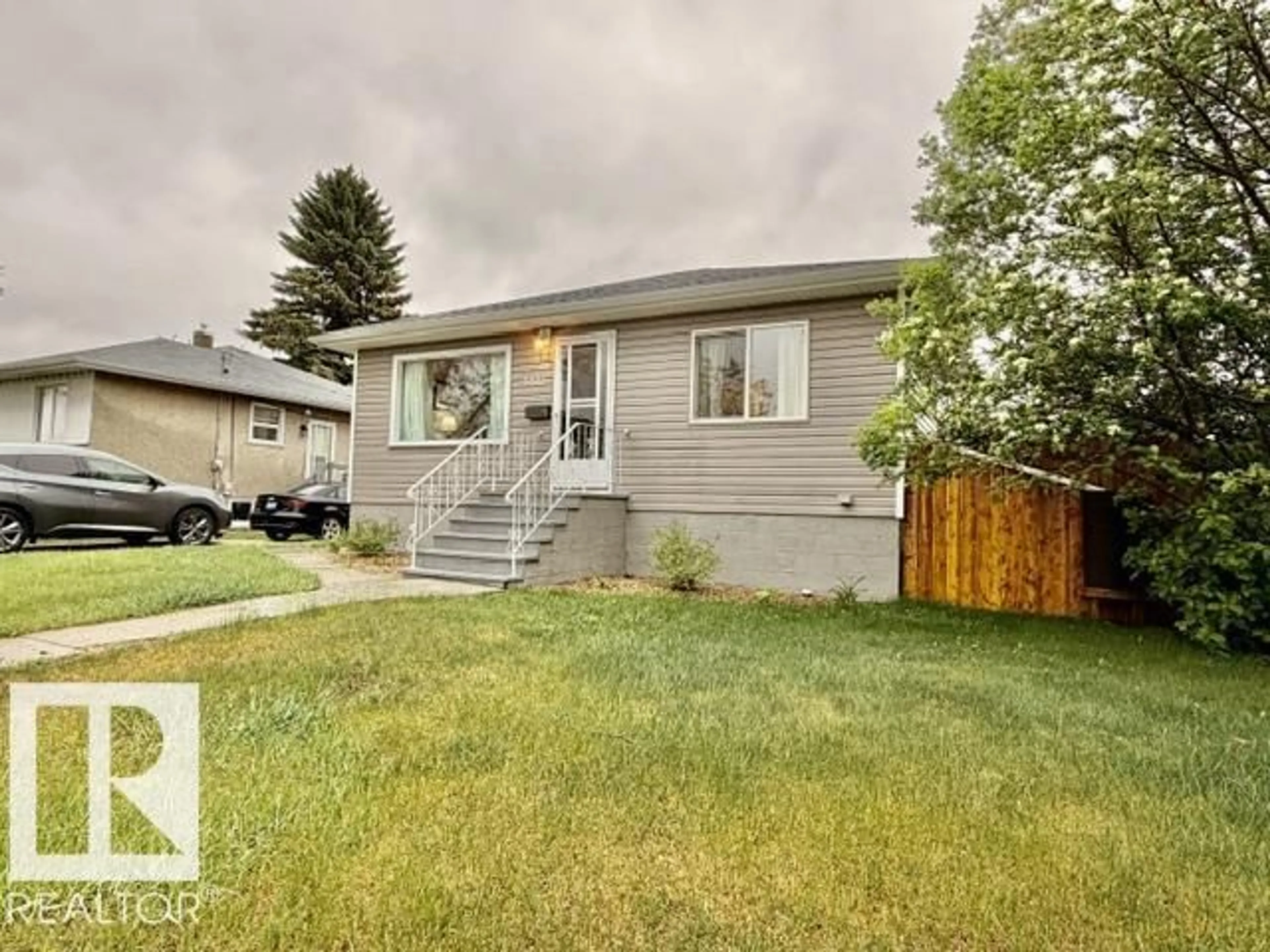 Home with vinyl exterior material, street for 5611 51 AV, Camrose Alberta T4V0W3