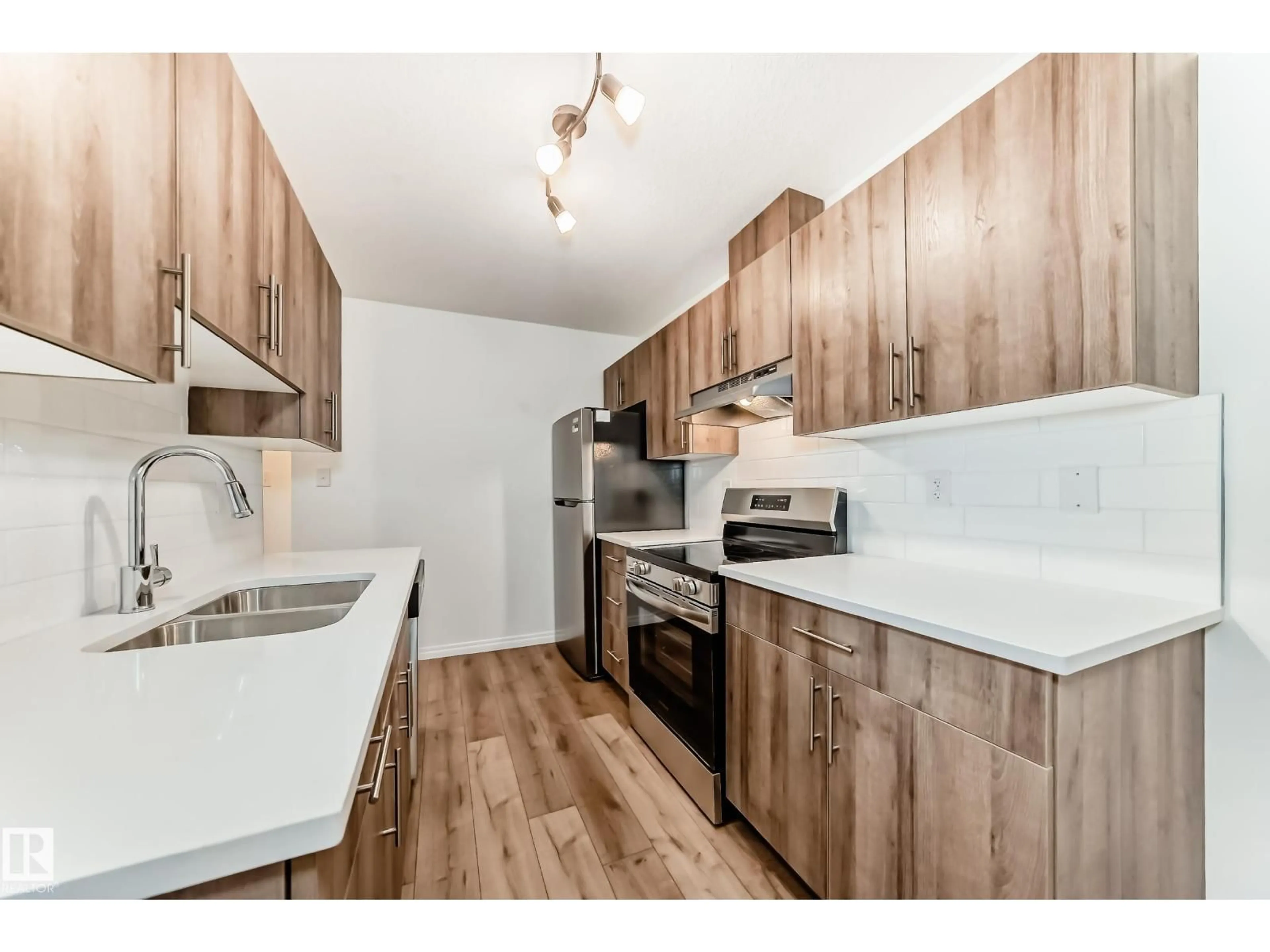 Standard kitchen, wood/laminate floor for #305 - 6208 180 ST, Edmonton Alberta T5T2T2