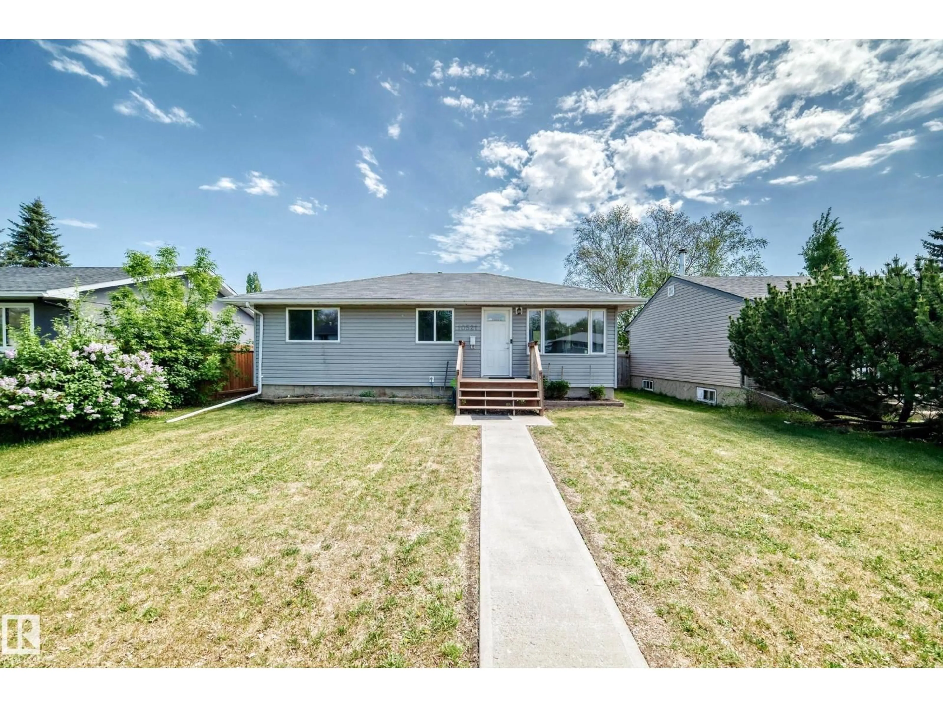 Home with vinyl exterior material, street for NW - 10521 163 ST, Edmonton Alberta T5P3P2