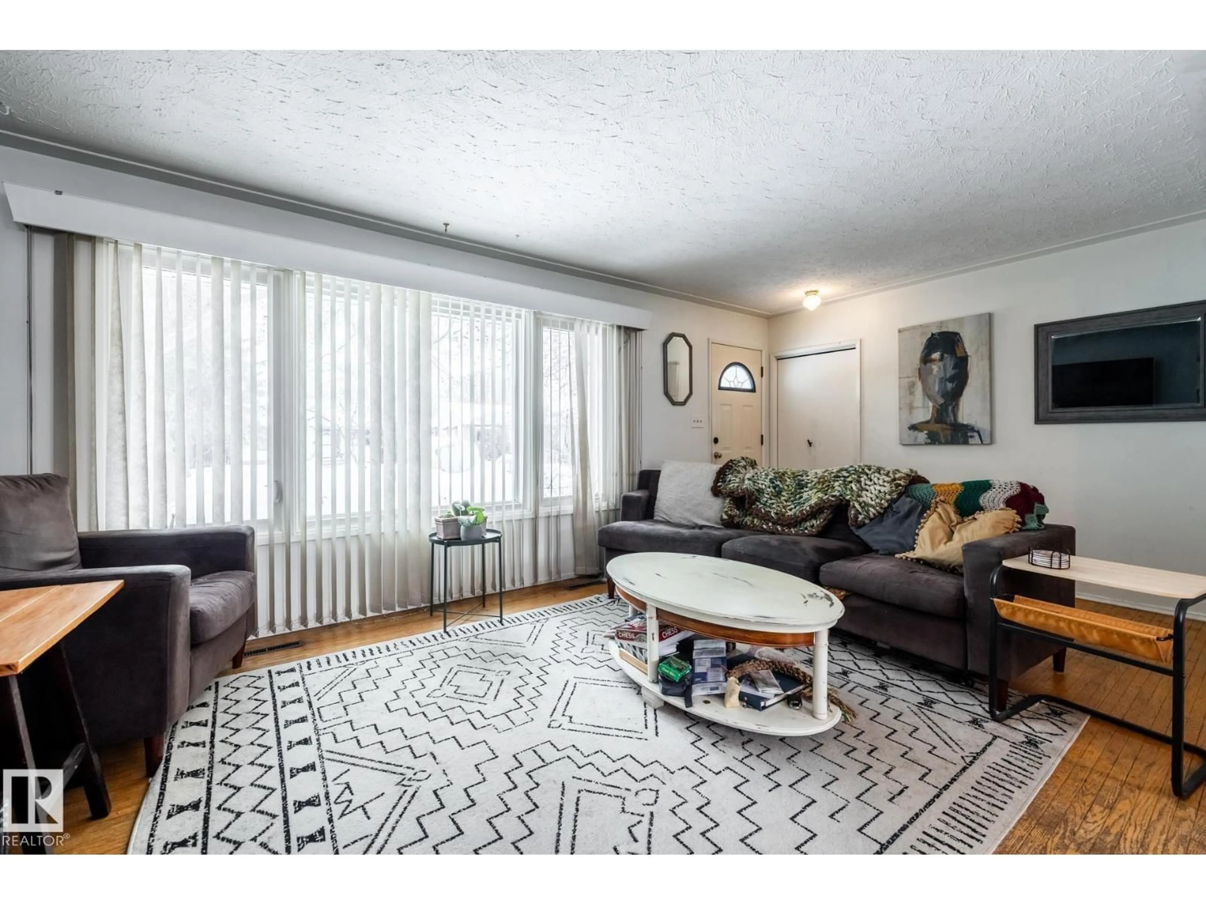 Living room with furniture, unknown for 12231 47 ST, Edmonton Alberta T5W2X6