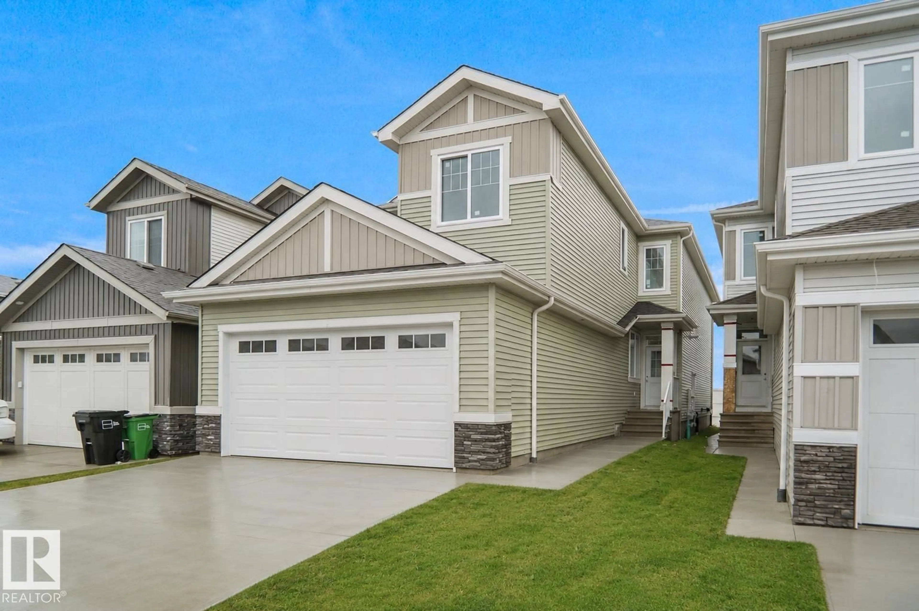 Home with vinyl exterior material, street for 803 30 AV, Edmonton Alberta T6T2V3
