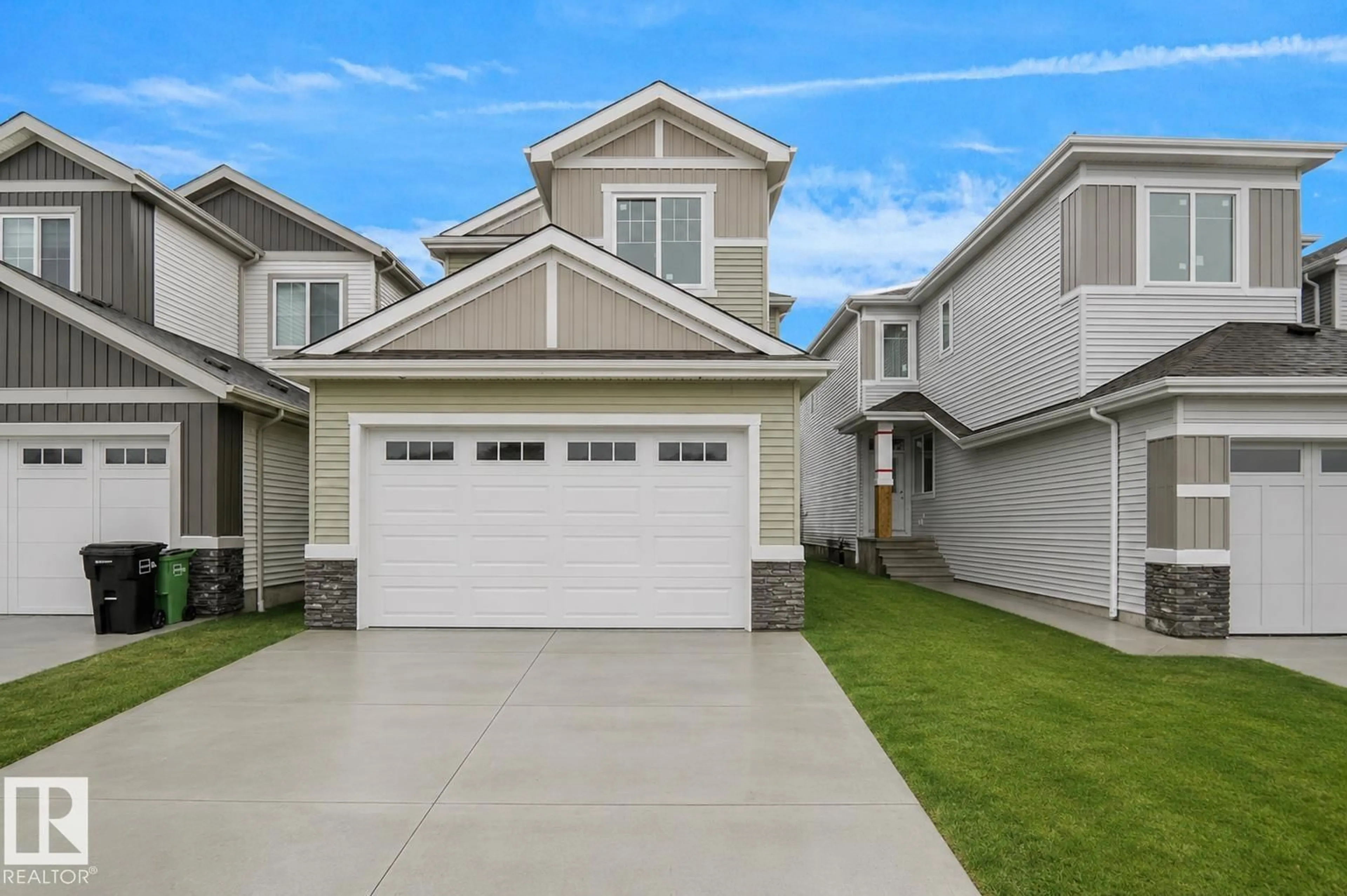 Home with vinyl exterior material, street for 803 30 AV, Edmonton Alberta T6T2V3