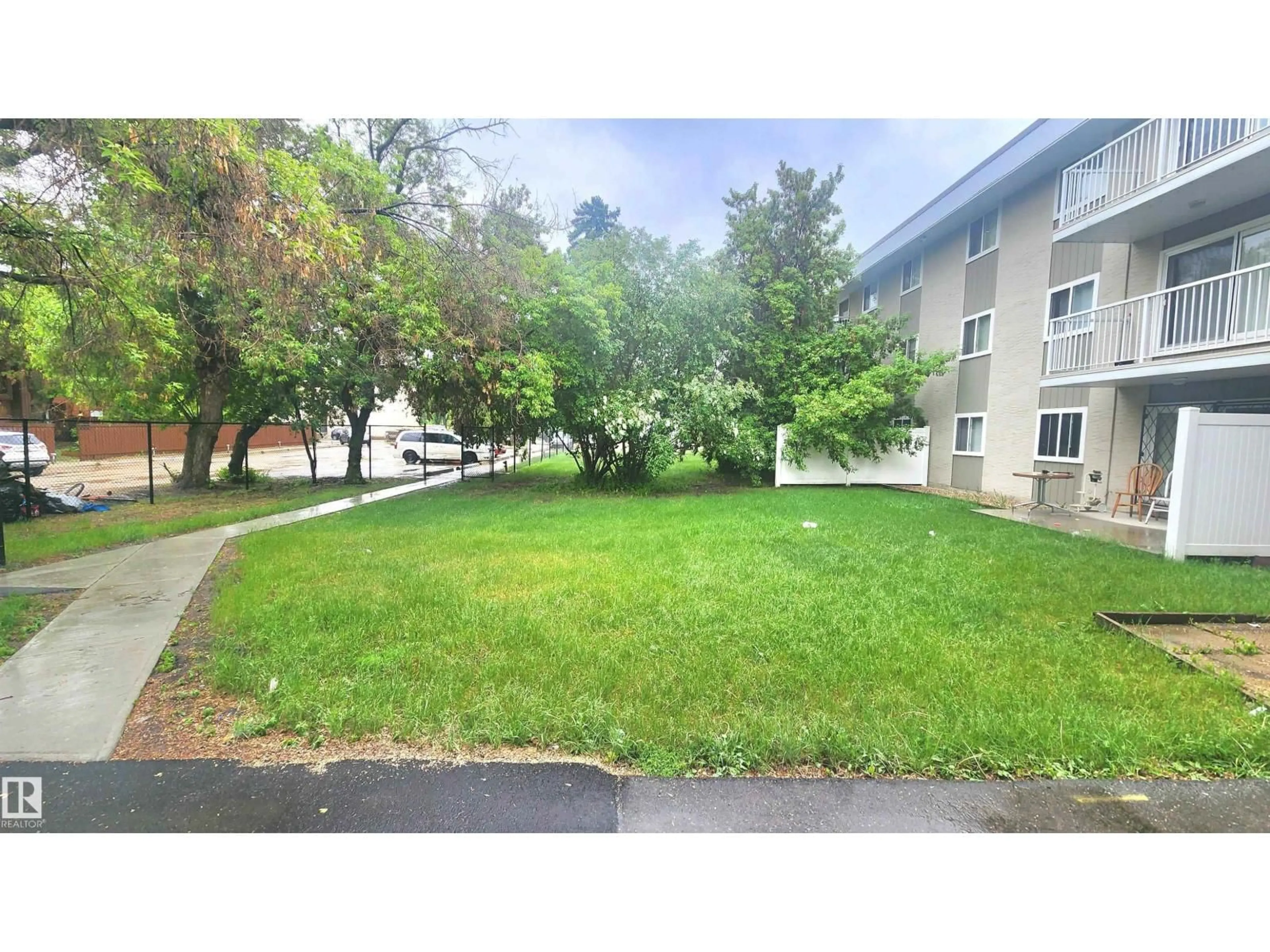 A pic from outside/outdoor area/front of a property/back of a property/a pic from drone, street for #212 - 10835 114 ST, Edmonton Alberta T5H3K3