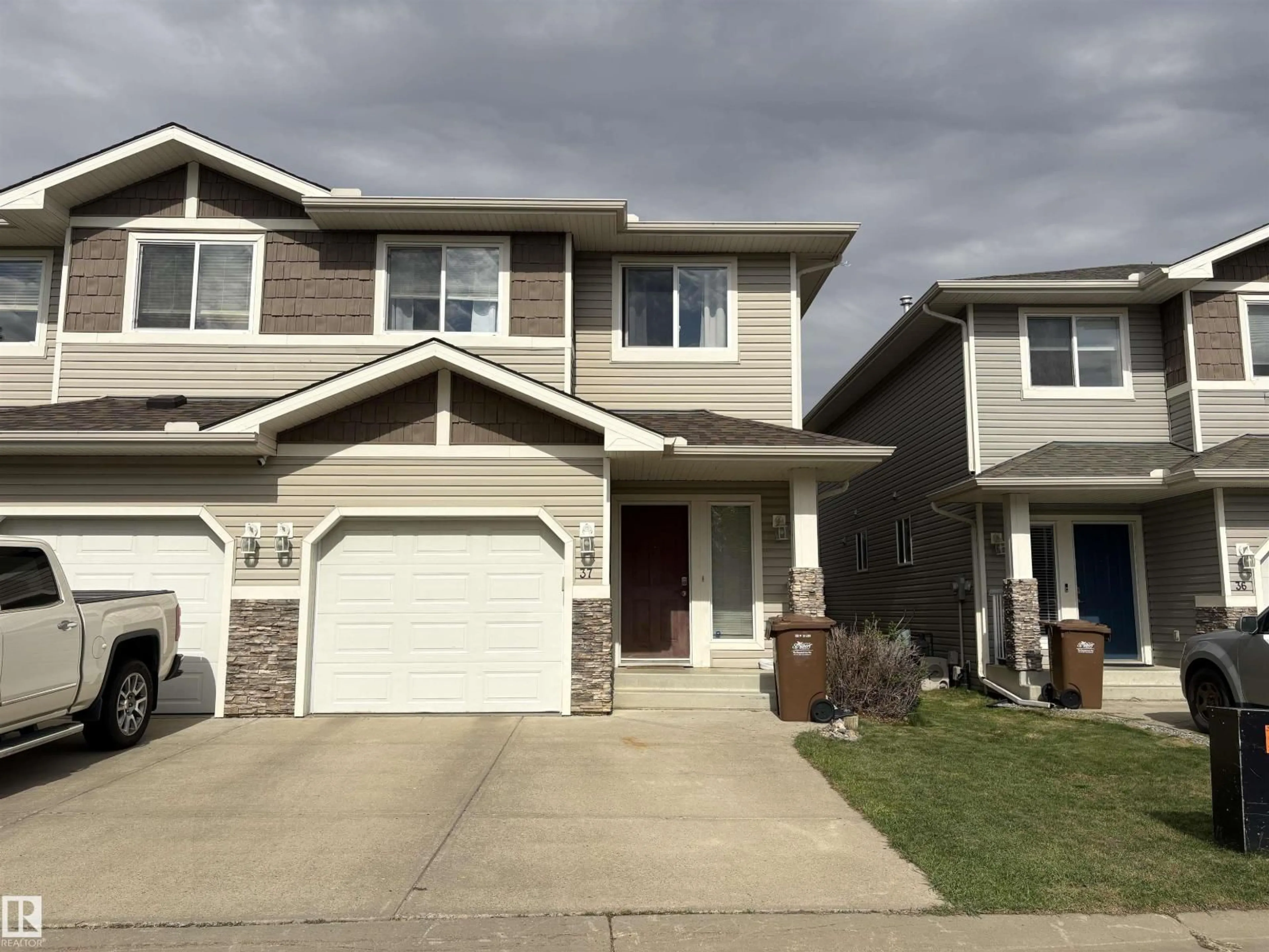 Home with vinyl exterior material, street for #37 - 133 EASTGATE WY, St. Albert Alberta T8N7M9
