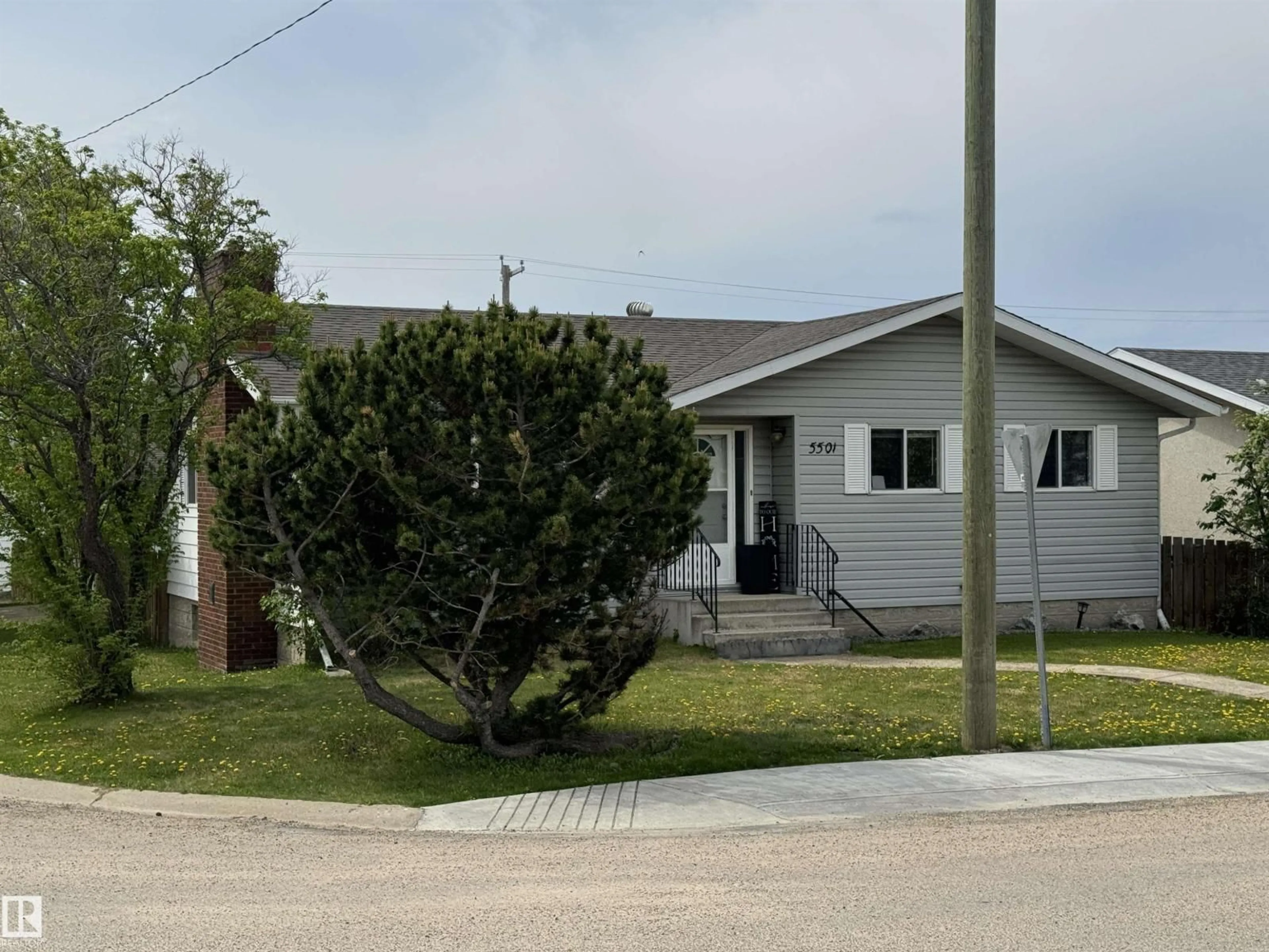 Home with vinyl exterior material, street for 5501 46 AV, Drayton Valley Alberta T7A1K2