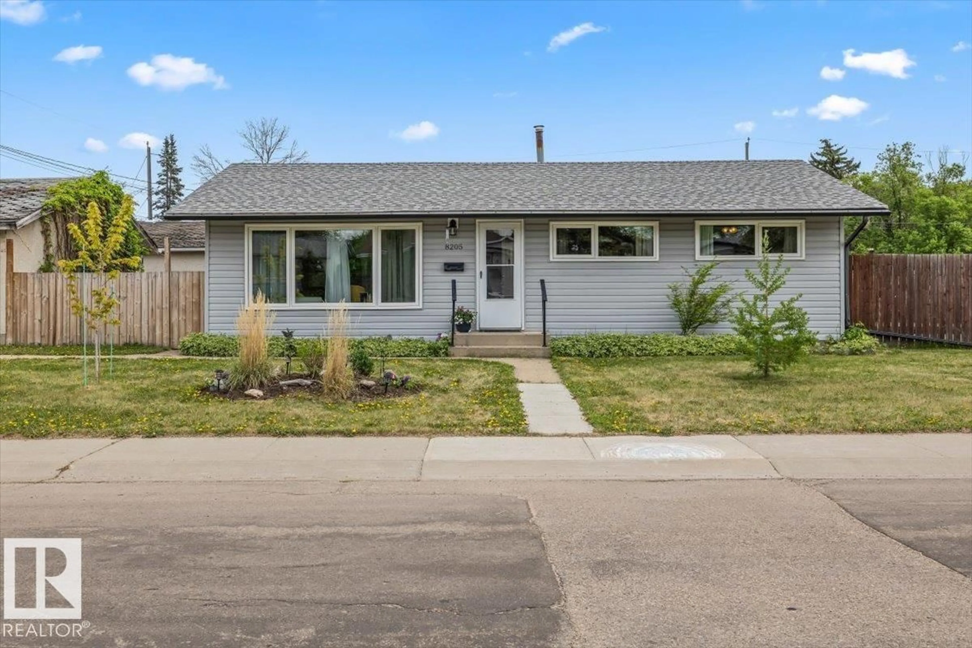 Home with vinyl exterior material, street for 8205 162 ST, Edmonton Alberta T5R2L9