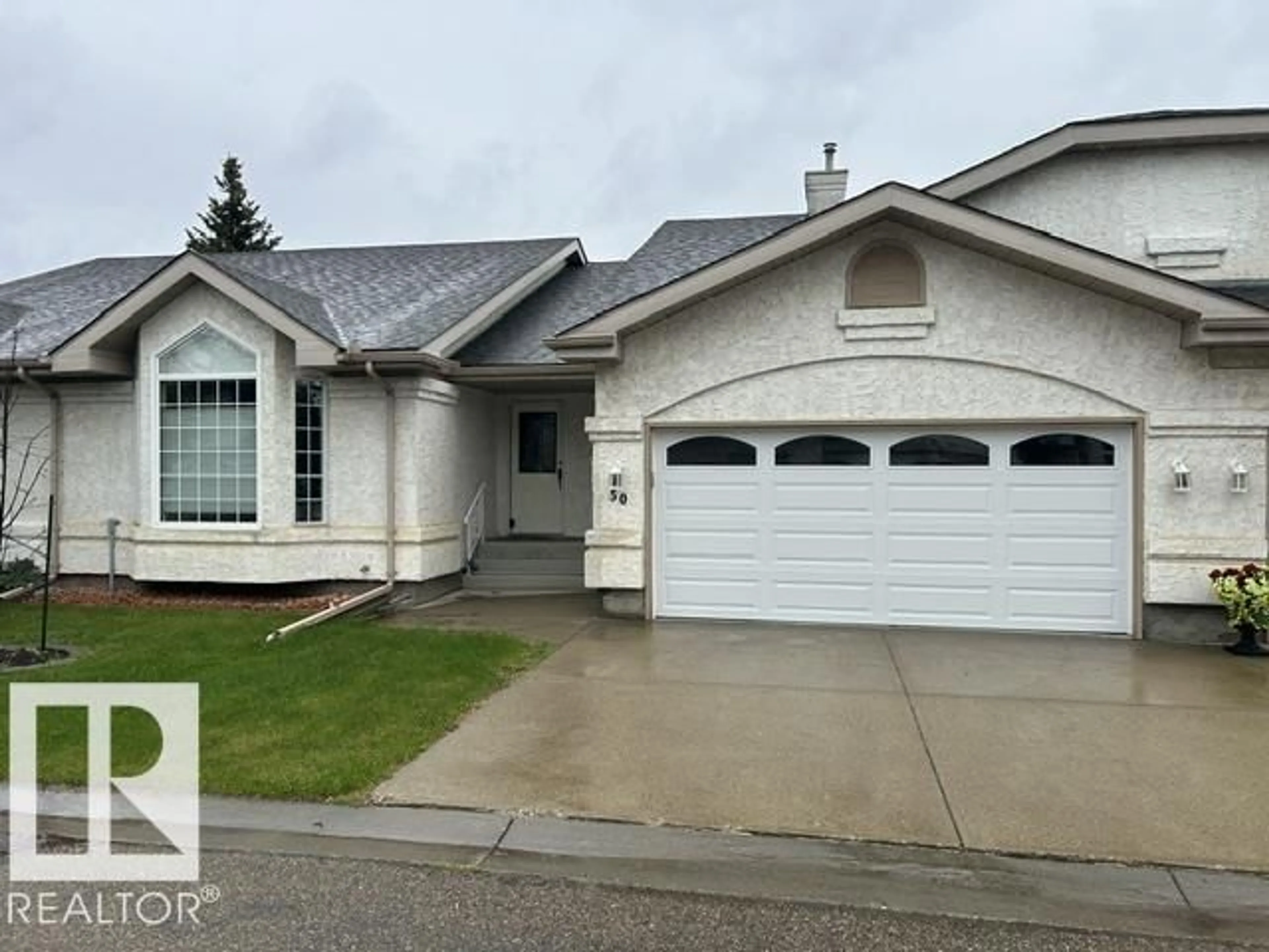 Home with vinyl exterior material, street for 50 303 TWIN BROOKS DR, Edmonton Alberta T6J6V3