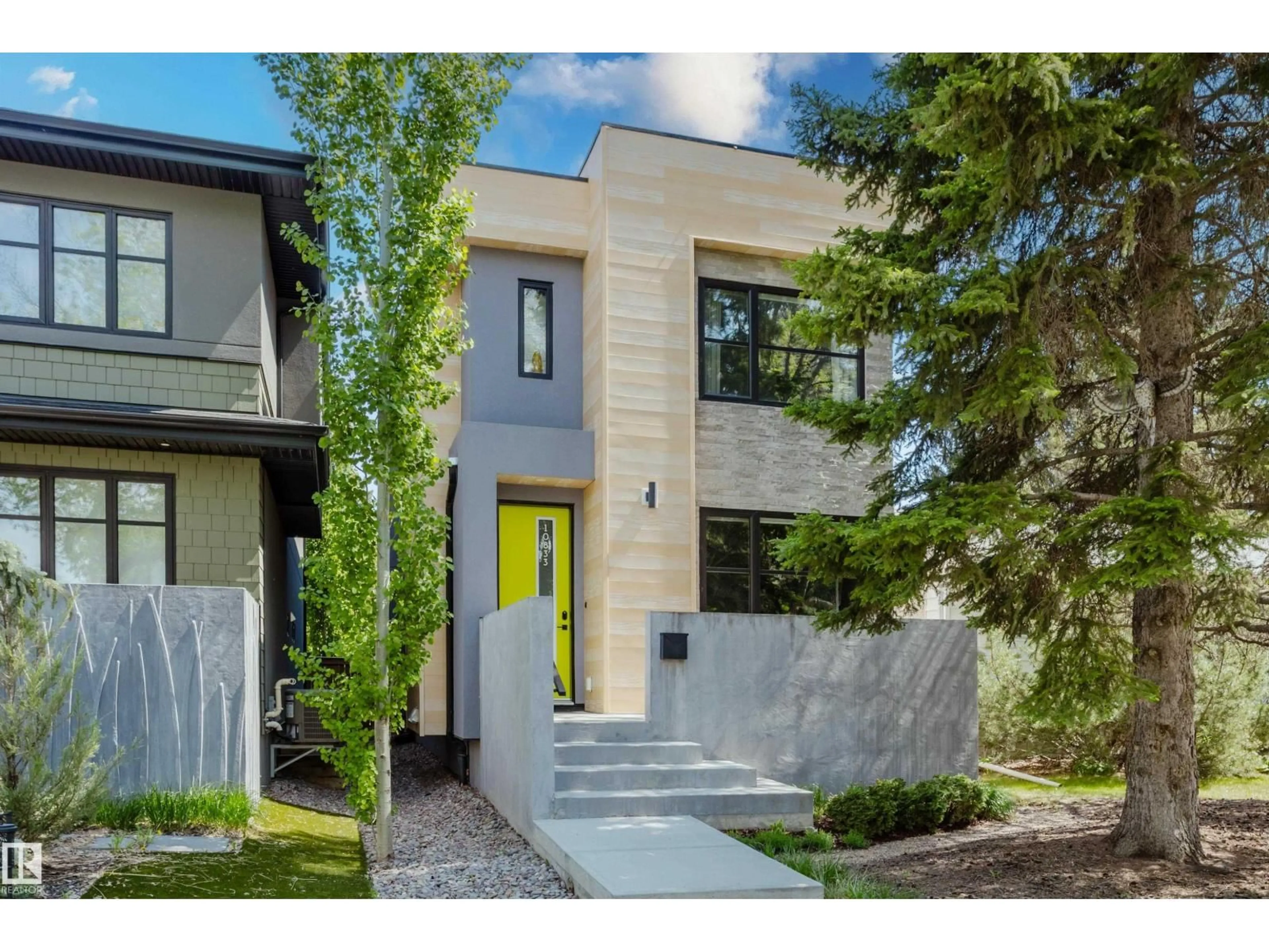 Home with brick exterior material, street for NW - 10833 140 ST, Edmonton Alberta T5M1S4