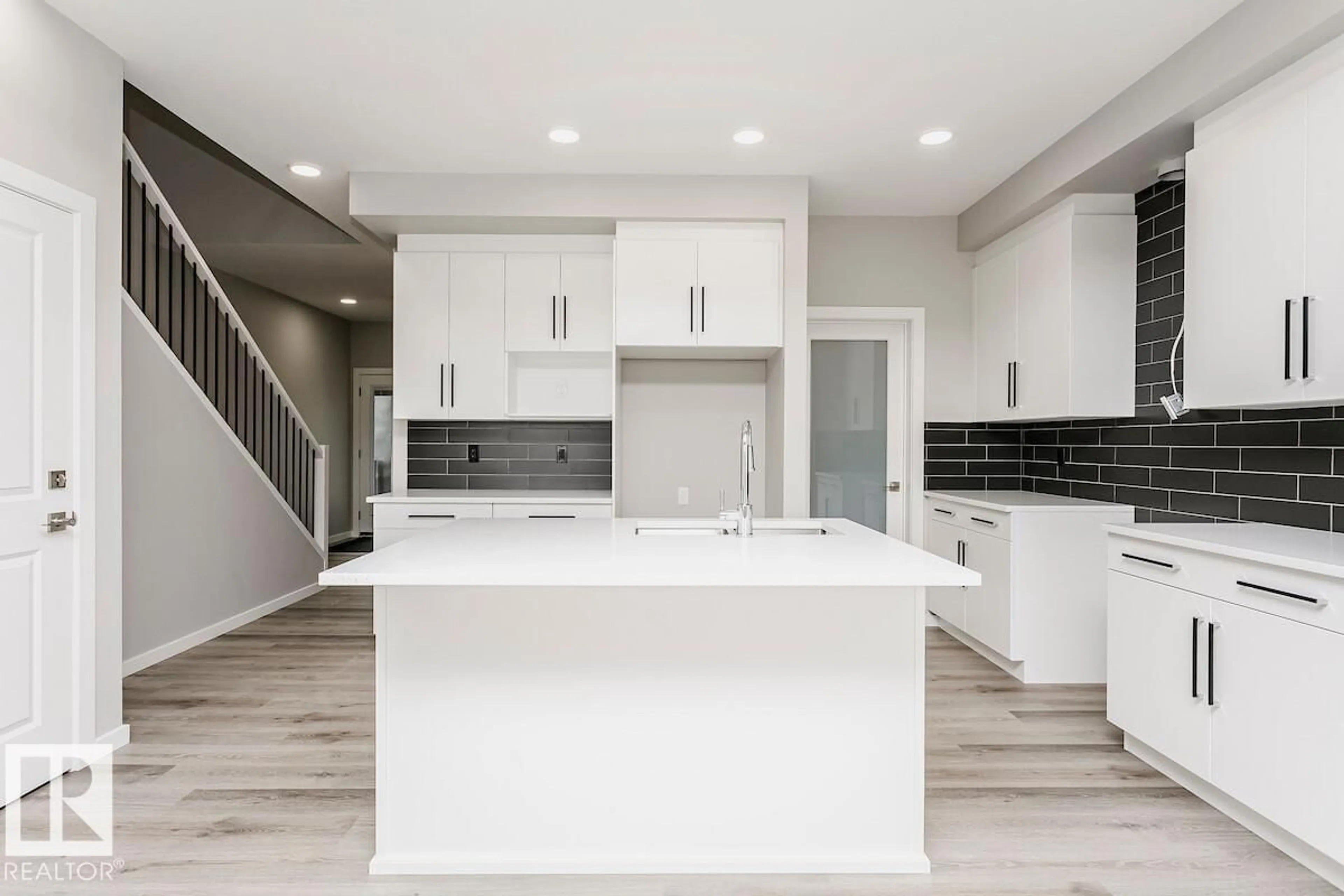 Open concept kitchen, ceramic/tile floor for 2811 62 ST, Edmonton Alberta T6X0W2