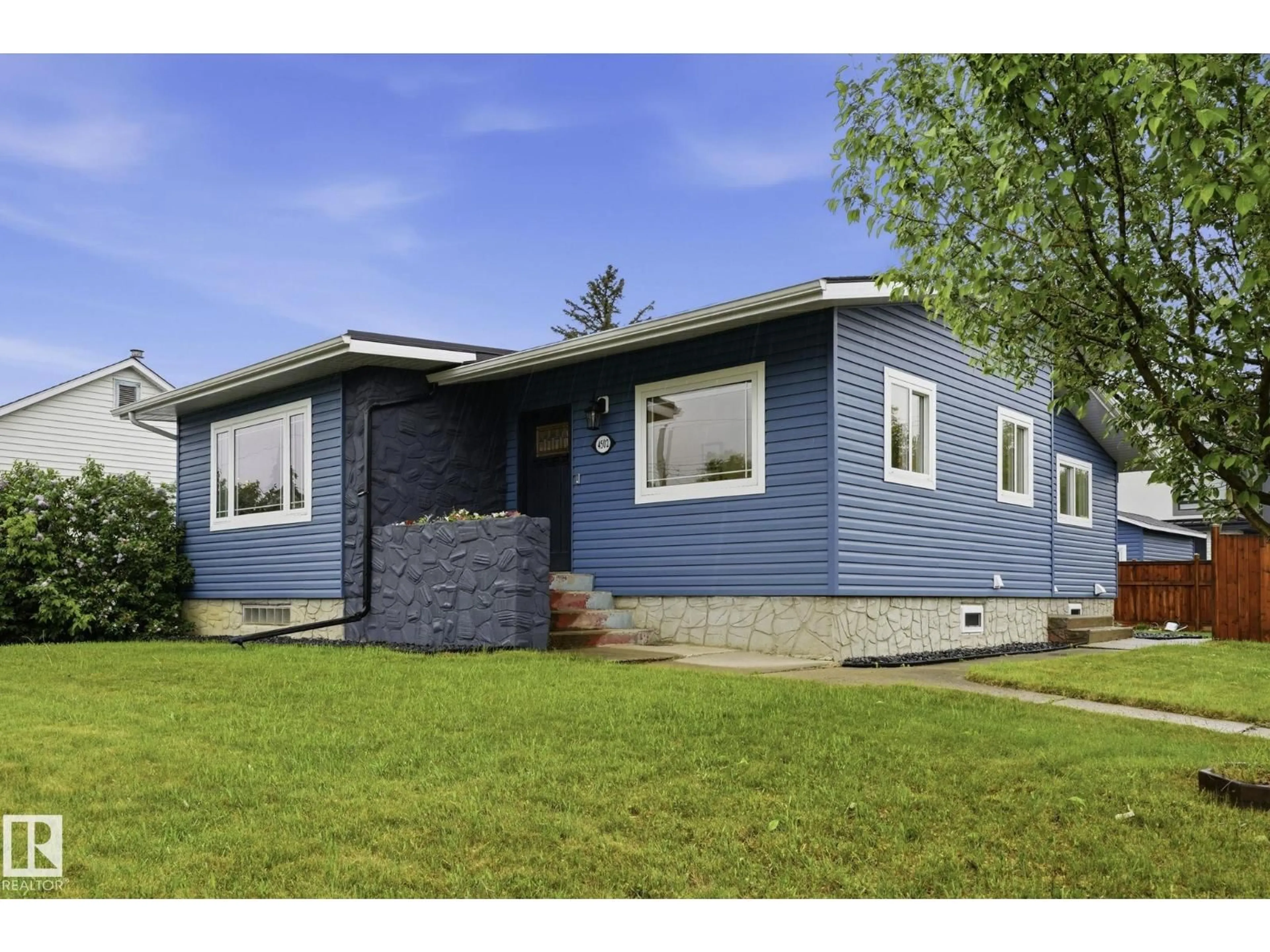 Home with vinyl exterior material, street for 4502 53 AV, Leduc Alberta T9E5W3