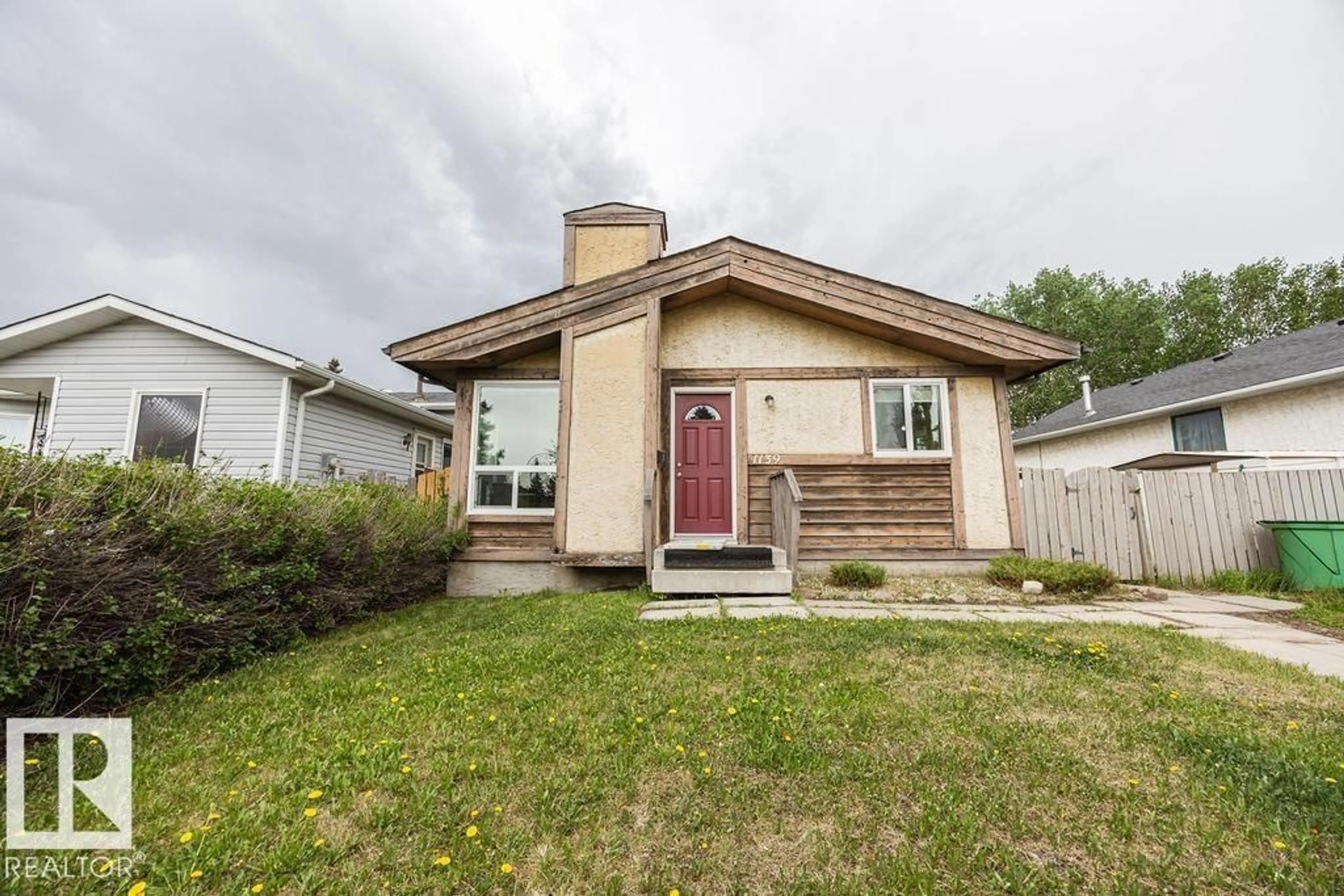 Home with vinyl exterior material, street for 1139 35 ST, Edmonton Alberta T6L2L3
