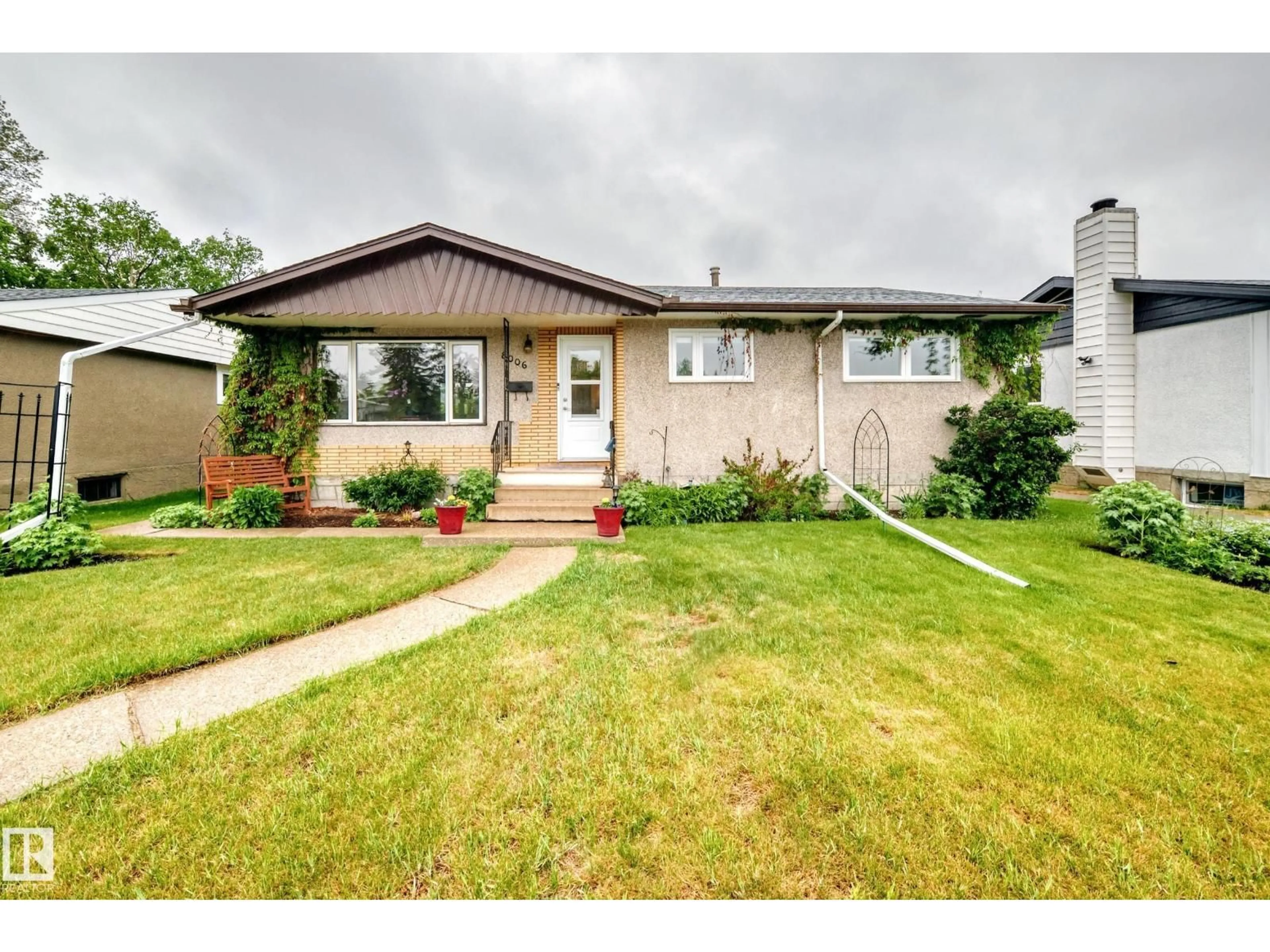 Home with vinyl exterior material, street for 8006 159 ST, Edmonton Alberta T5R2E3