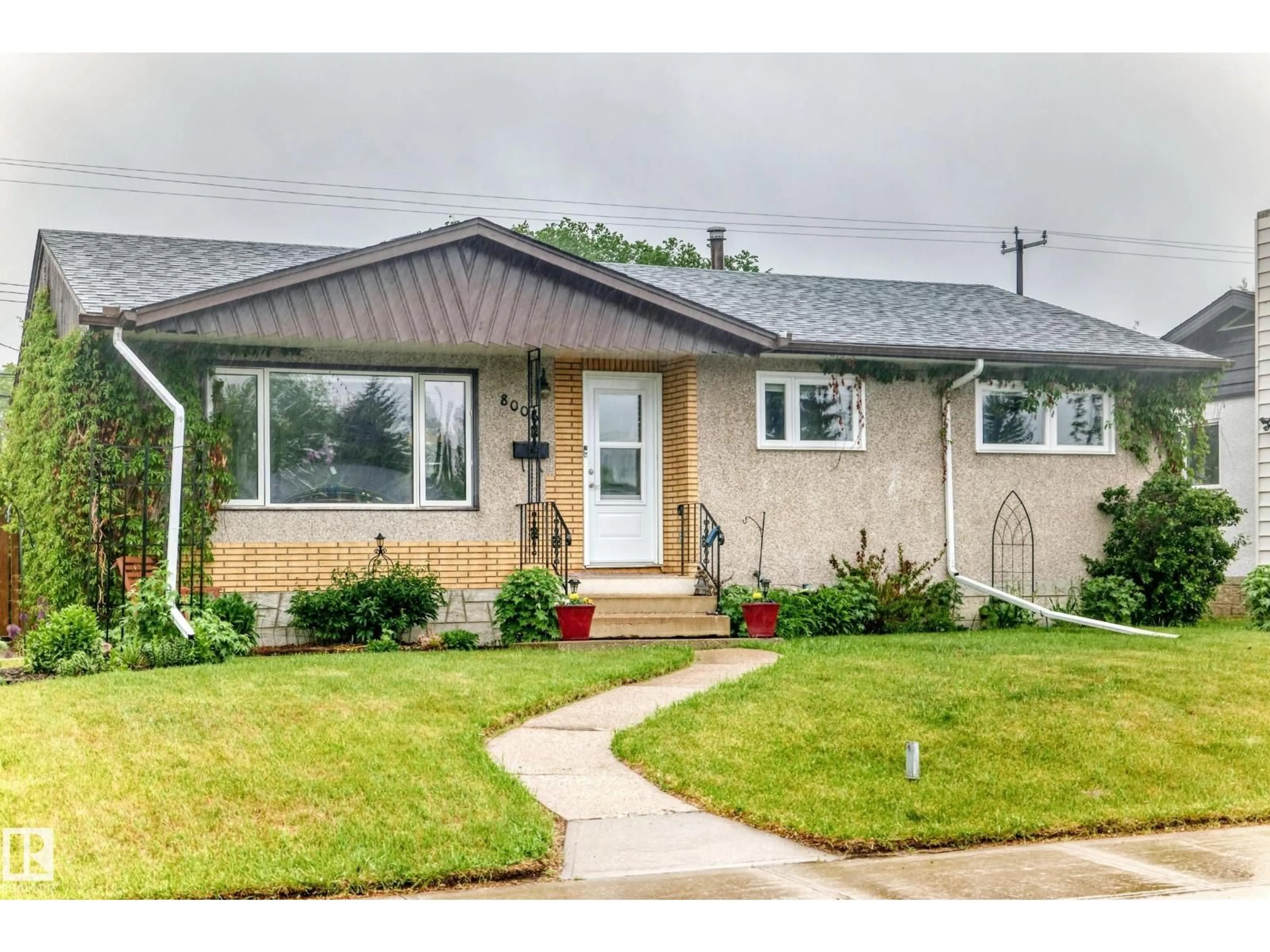 Home with vinyl exterior material, street for 8006 159 ST, Edmonton Alberta T5R2E3