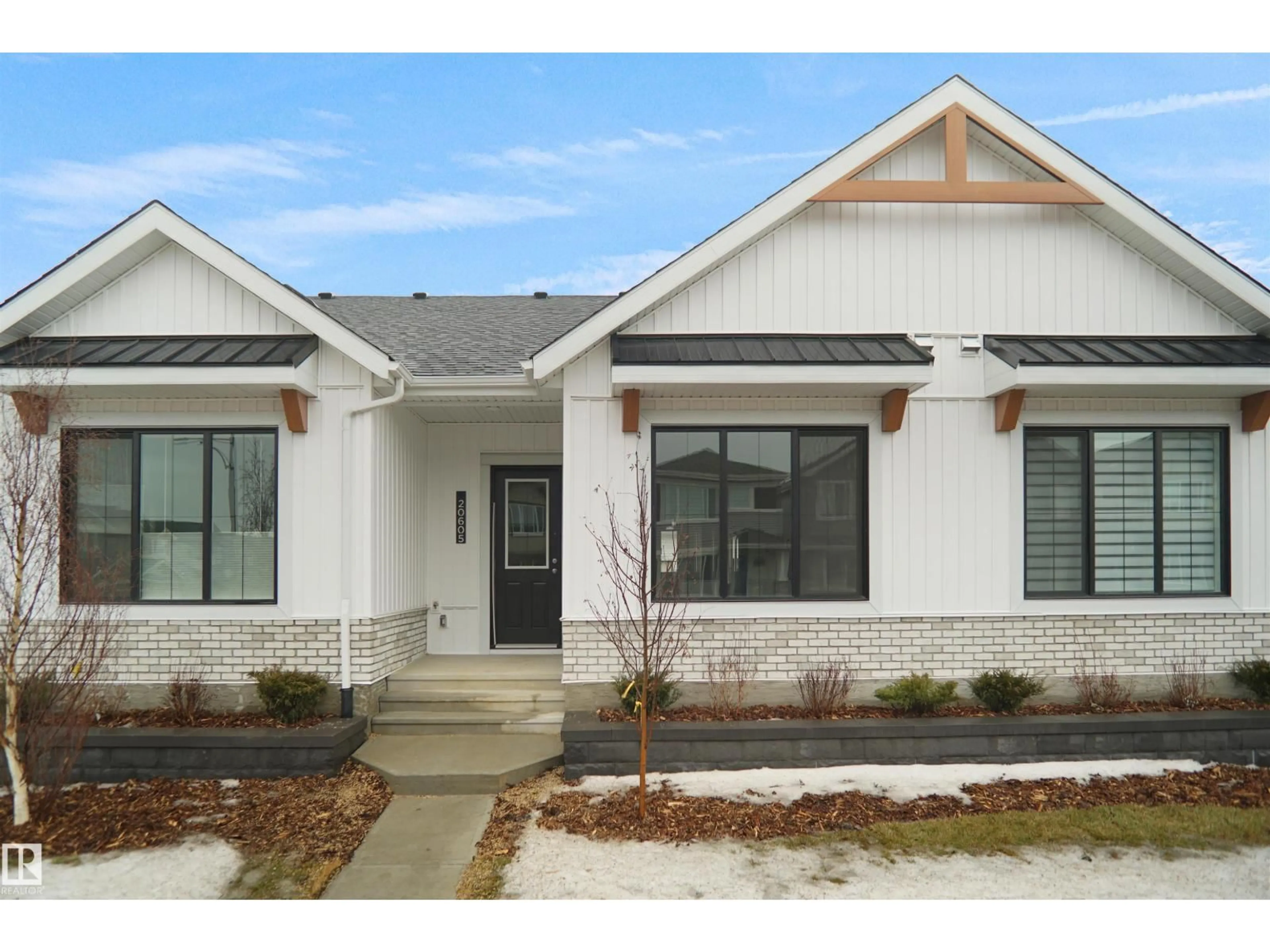 Home with brick exterior material, street for 20605 42 AV, Edmonton Alberta T6M0R8