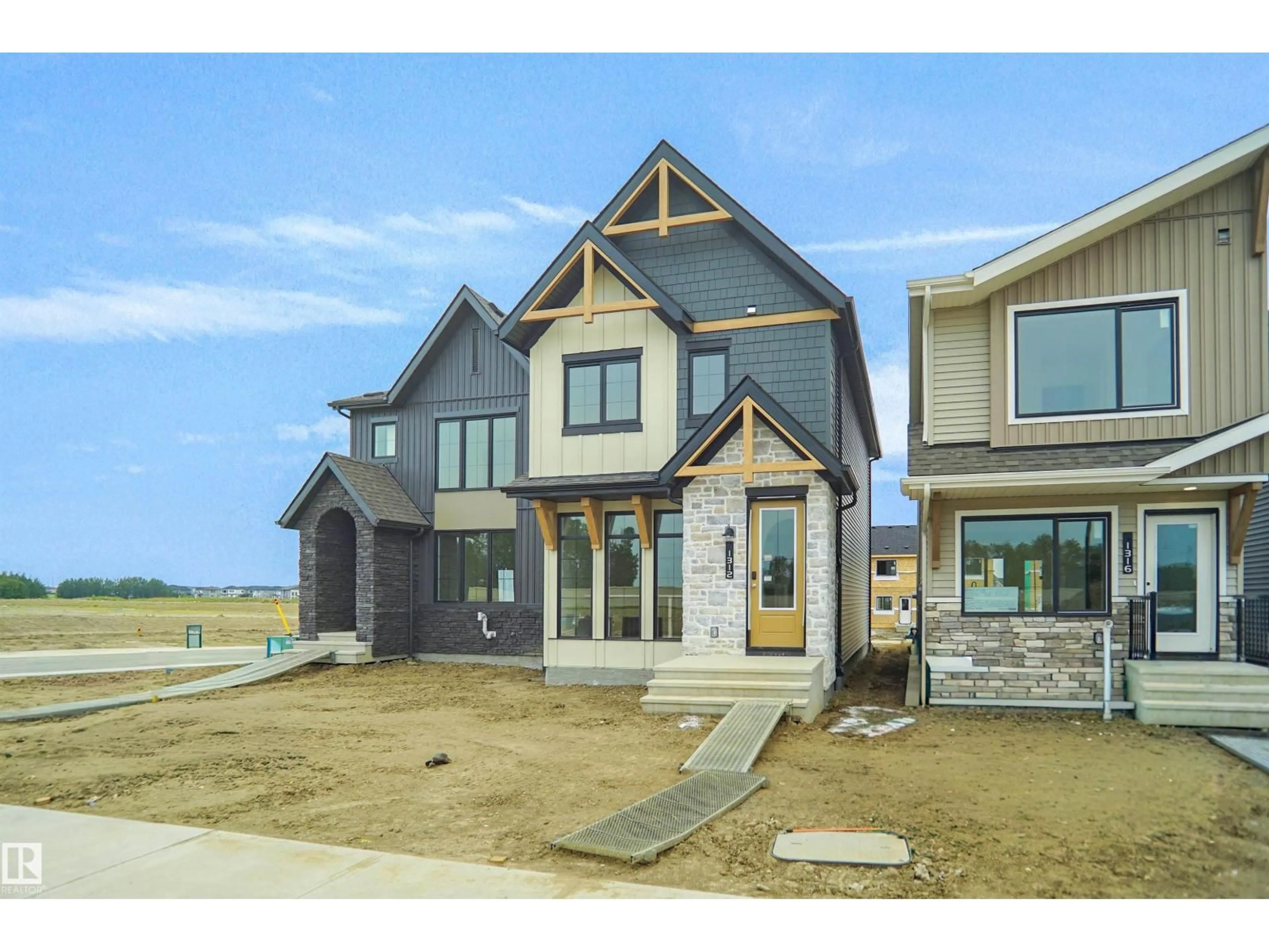 Home with brick exterior material, unknown for 1312 9 ST, Edmonton Alberta T6T2W2