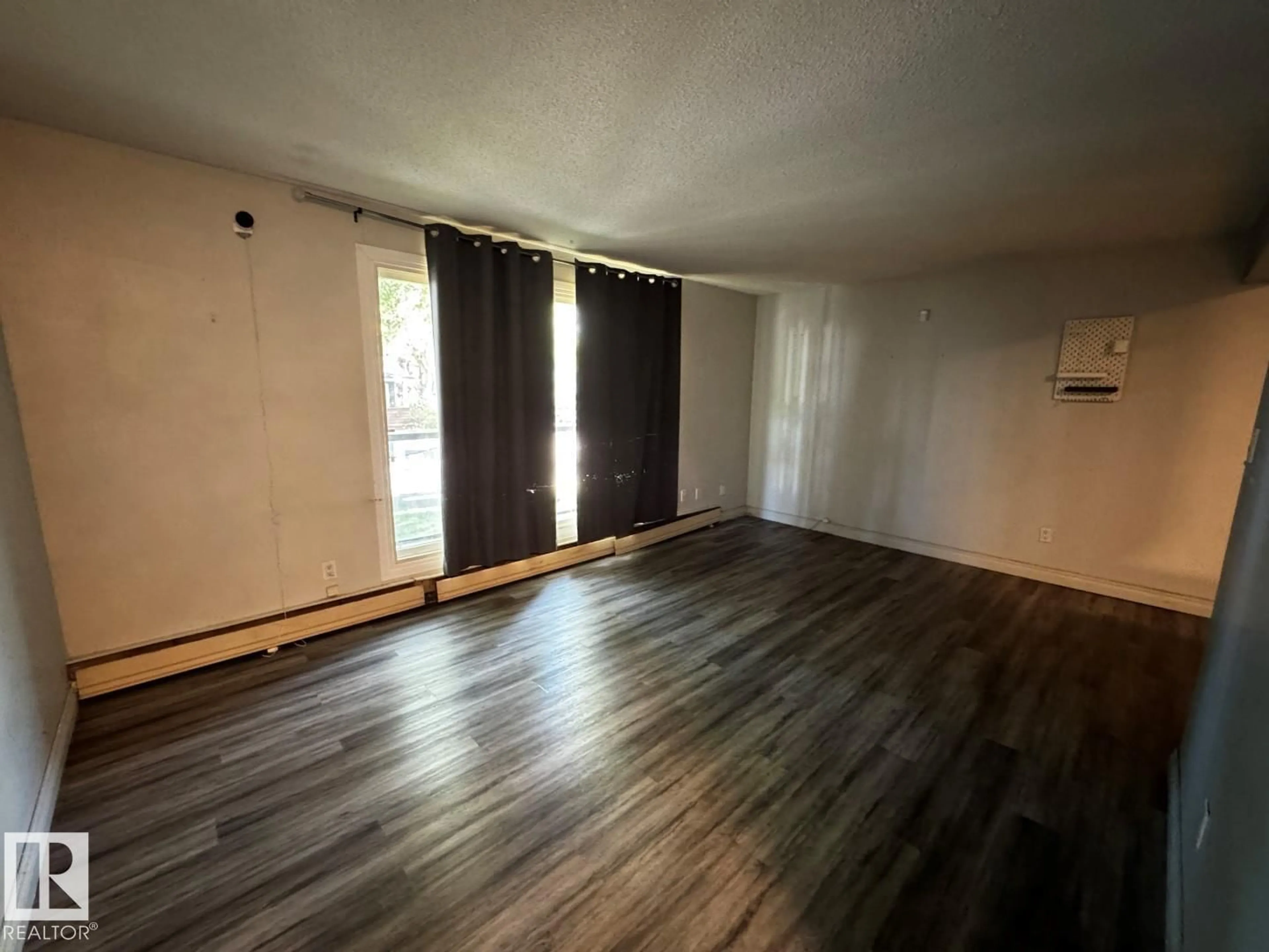 A pic of a room for #203 - 10415 93 ST, Edmonton Alberta T5H1X5
