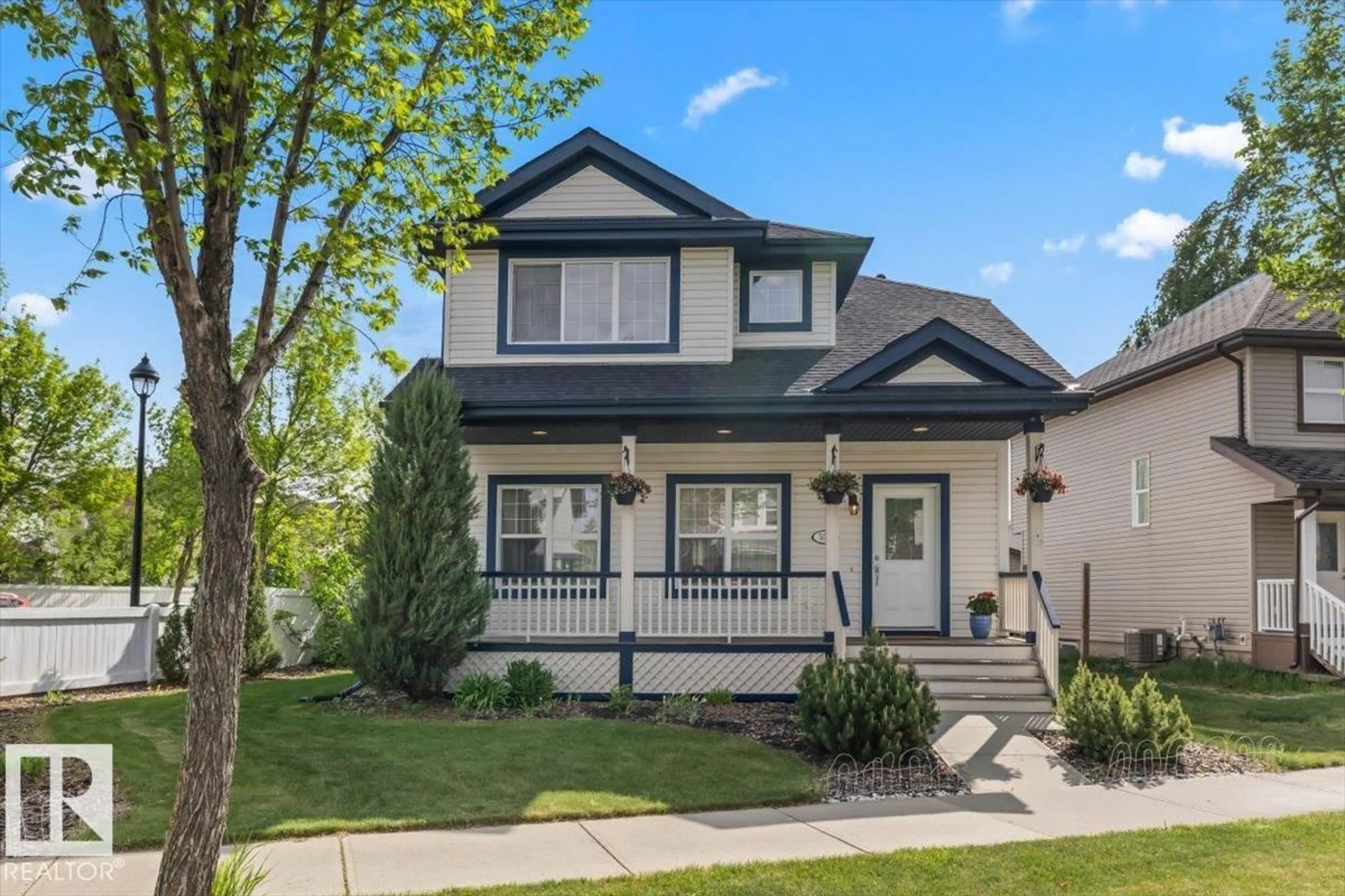 Home with vinyl exterior material, street for 5015 THIBAULT WY, Edmonton Alberta T6R3R4