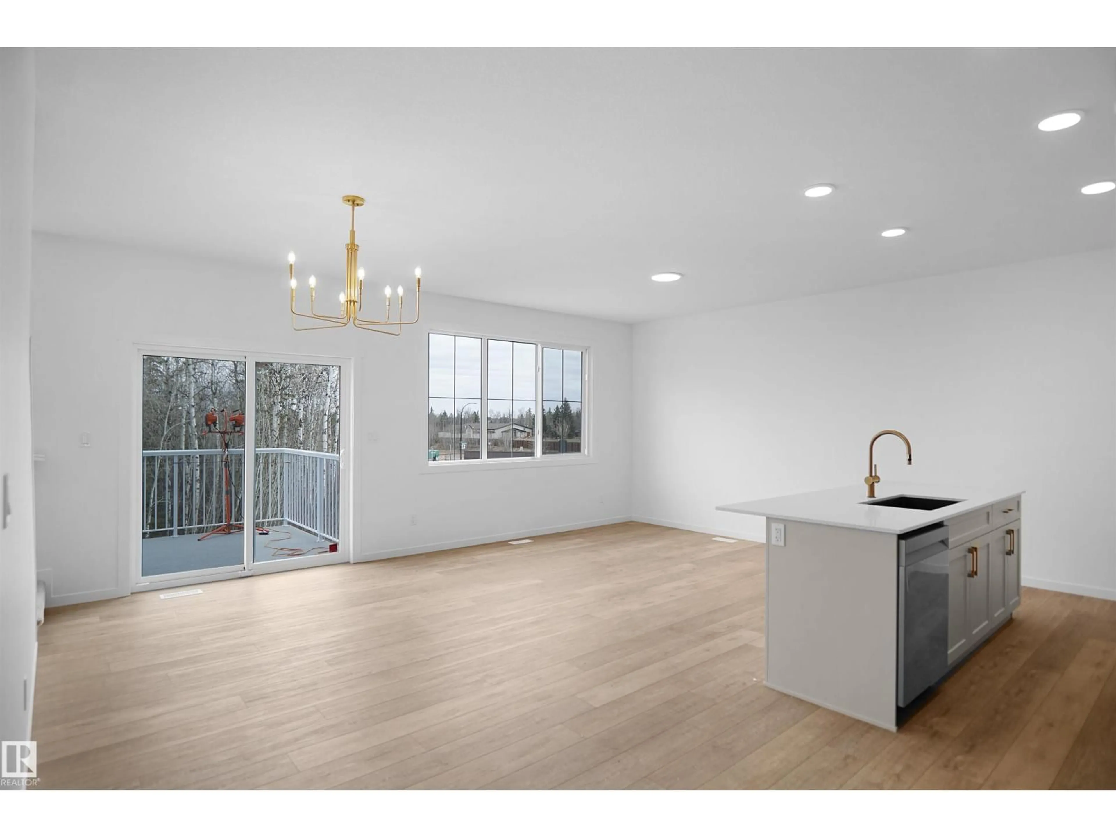 Open concept kitchen, wood/laminate floor for 20 19904 31 AV NW, Edmonton Alberta T6M1N7