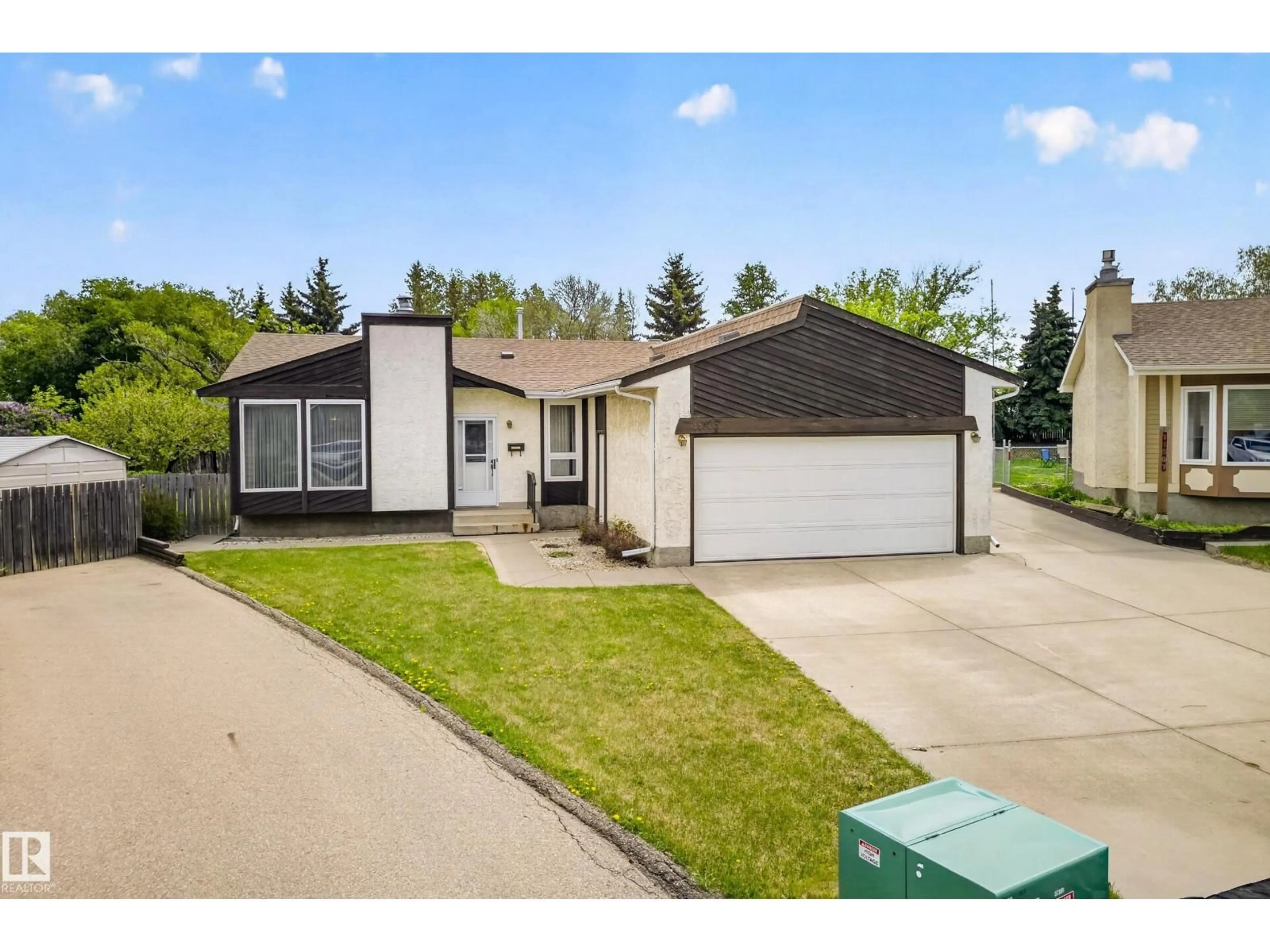 A pic from outside/outdoor area/front of a property/back of a property/a pic from drone, street for 11903 138 AV, Edmonton Alberta T5X4K1