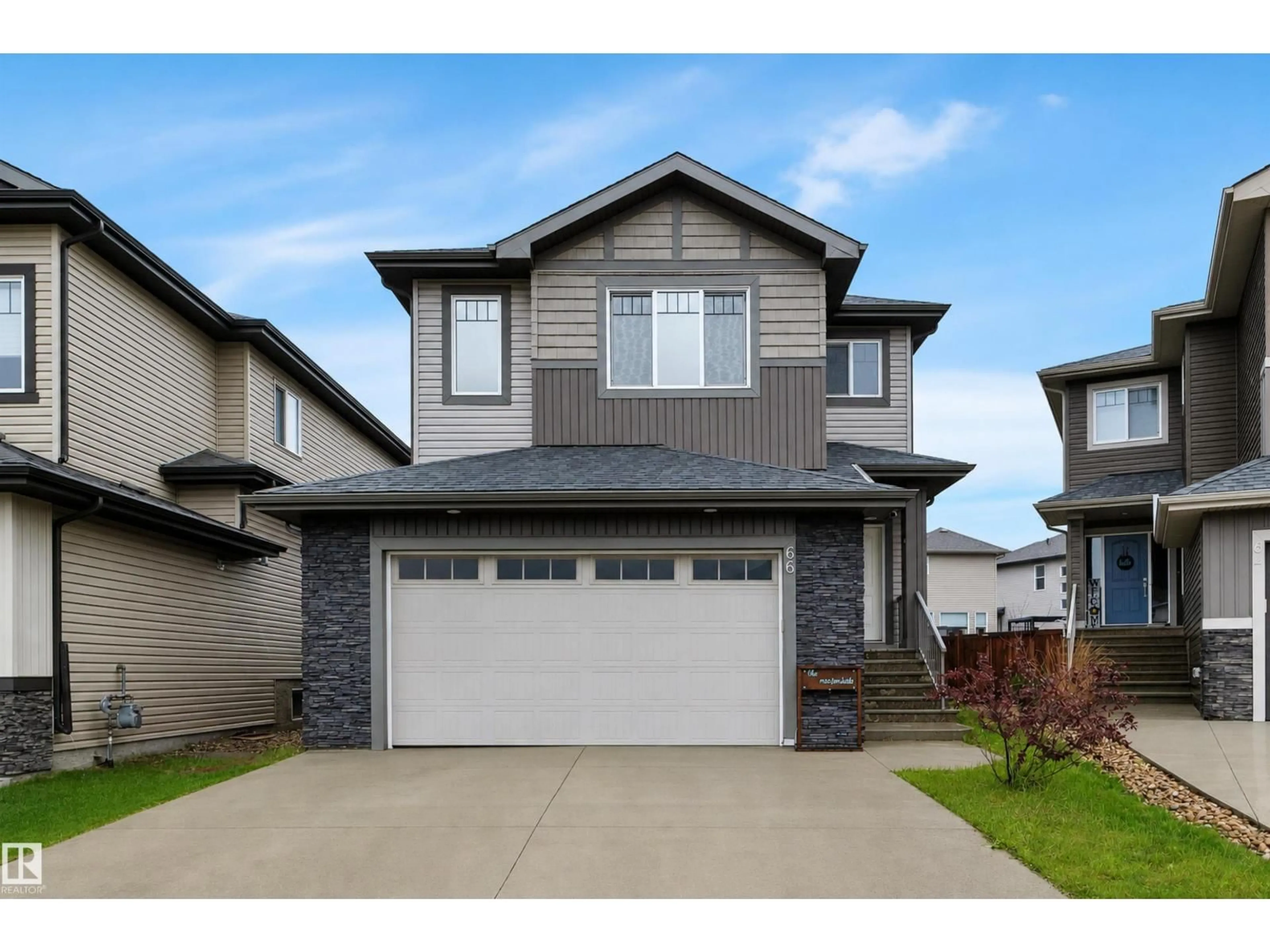 Home with vinyl exterior material, street for 66 MCKENZIE CO, Leduc Alberta T9E1A4